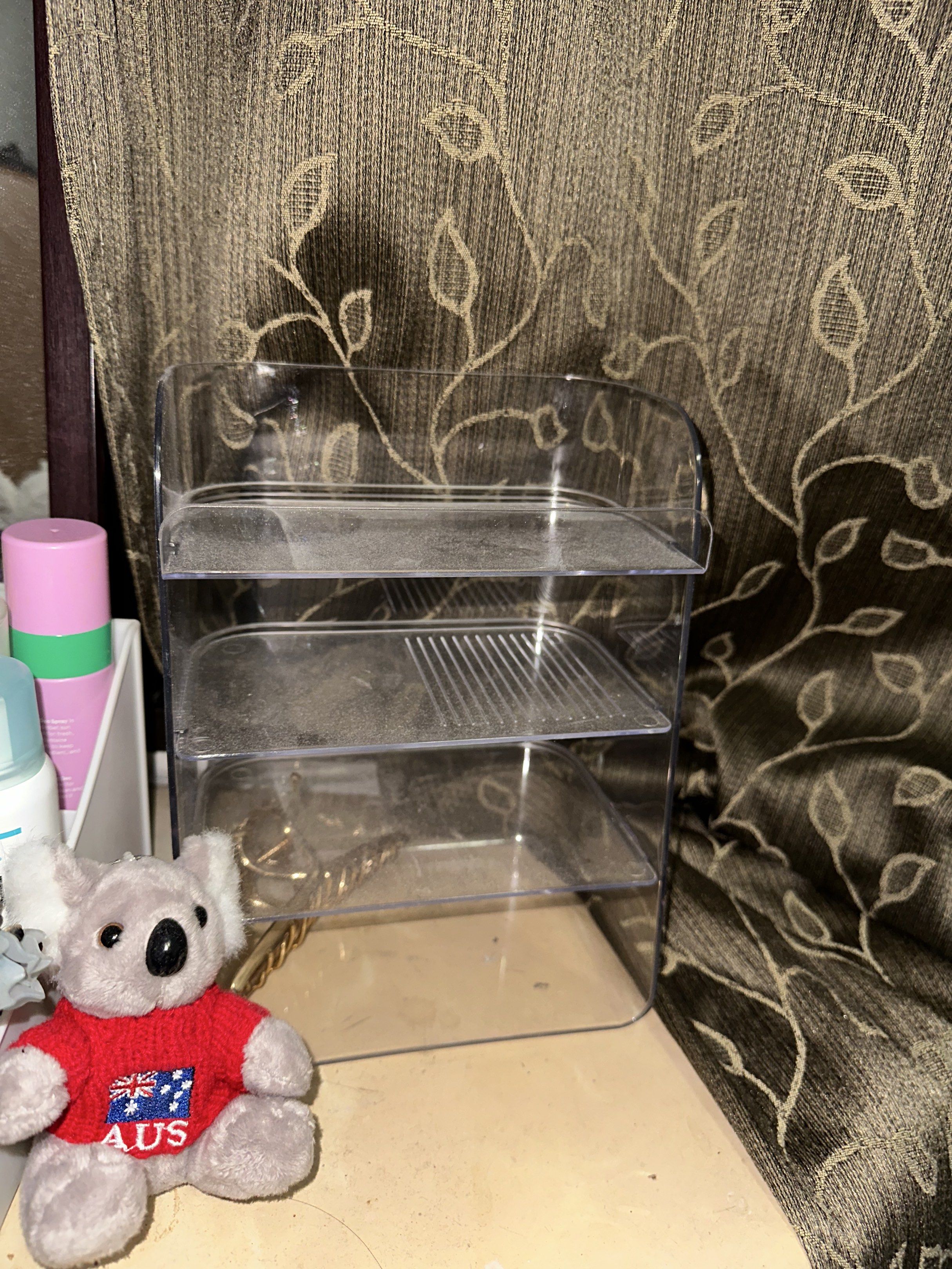 Clear Acrylic Makeup Organizer (Category: Makeup) located in Quezon City. Submitted by ina517 (Listing ID 1417748337, Image 2). Description: - Clear acrylic makeup organizer - Tiered design for easy organization - Multiple compartments for storage - Perfect for makeup, skincare, and small items - Keeps essentials neatly arranged - Great for vanity or bathroom countertop.