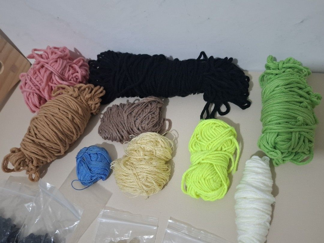 Crochet Crafts (Tools & Yarn) (Category: Craft Supplies & Tools) located in Tacloban City. Submitted by cheebamay (Listing ID 1417708614, Image 2). Description: loc: tacloban city - preloved leftover assorted yarn - 9 and 6 mm black safety eyes - plastic needle, buttons and locks -5mm crochet hook - 2 small crochet hook (see close pic) - one cutter (last pic).