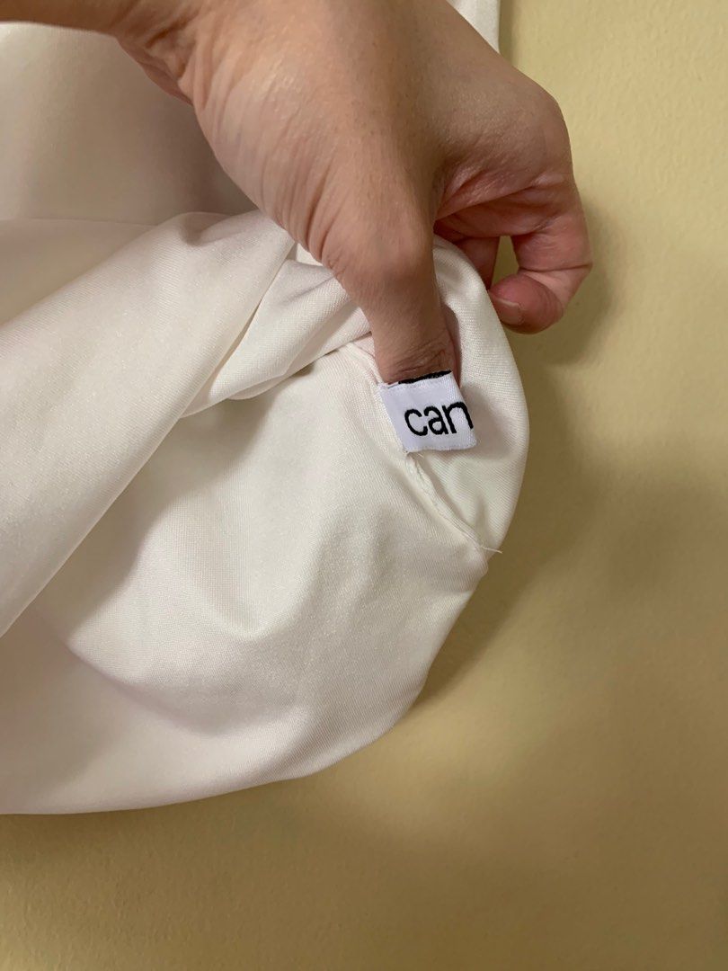 White Sleeveless Do it All Tank (2-way tank) (Category: Blouses) located in Marikina City. Submitted by projectsparkjoy (Listing ID 1417616960, Image 3). Description: Brand: Candid Clothing Color: Ecru white Size: small ✨Brand new✨ ✨Can be worn in 2 ways: Boat neckline and V-neckline tank top ✨Stretch fabric .