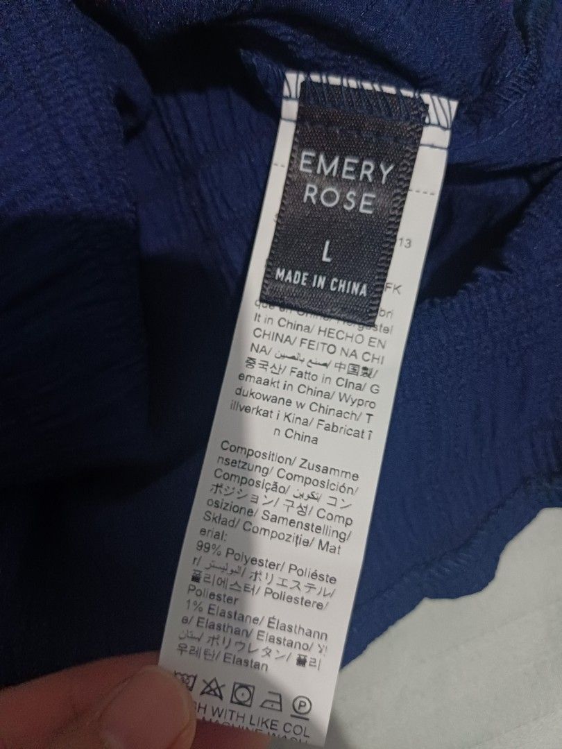 Emery Rose Navy Blue Top - Size L (Category: Sleeveless) located in Paranaque City. Submitted by joyrose (Listing ID 1417712591, Image 3). Description: - Emery Rose navy blue top - Size: L - Features a round neckline and short sleeves - Made of textured fabric (99% polyester, 1% elastane).