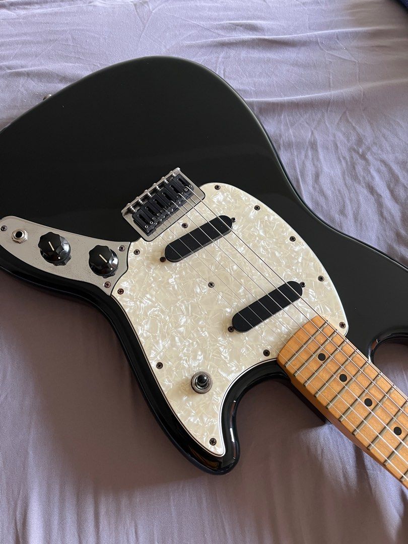 Fender Mustang (Category: Musical Instruments) located in Taguig. Submitted by corgi_x (Listing ID 1417625675, Image 2). Description: Fender Mustang (2016 Offset Series) - Made in Mexico - Upgraded saddles (Graph Tec) - Set up by Guitar Pusher In excellent condition with cosmetics that could pass as brand new. Neck pick-up sometimes cuts out—a common Mustang quirk. Just wiggle the pick-up switch to get it back on. Selling for Php 39,999 (original