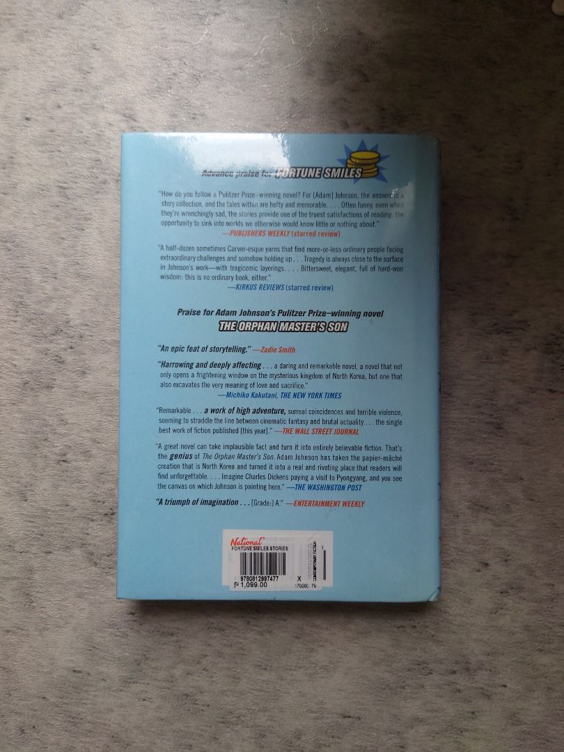 Fortune Smiles by Adam Johnson (Category: Storybooks) located in Taguig. Submitted by kitssale (Listing ID 1417633147, Image 2). Description: - "Fortune Smiles" by Adam Johnson - Hardbound.