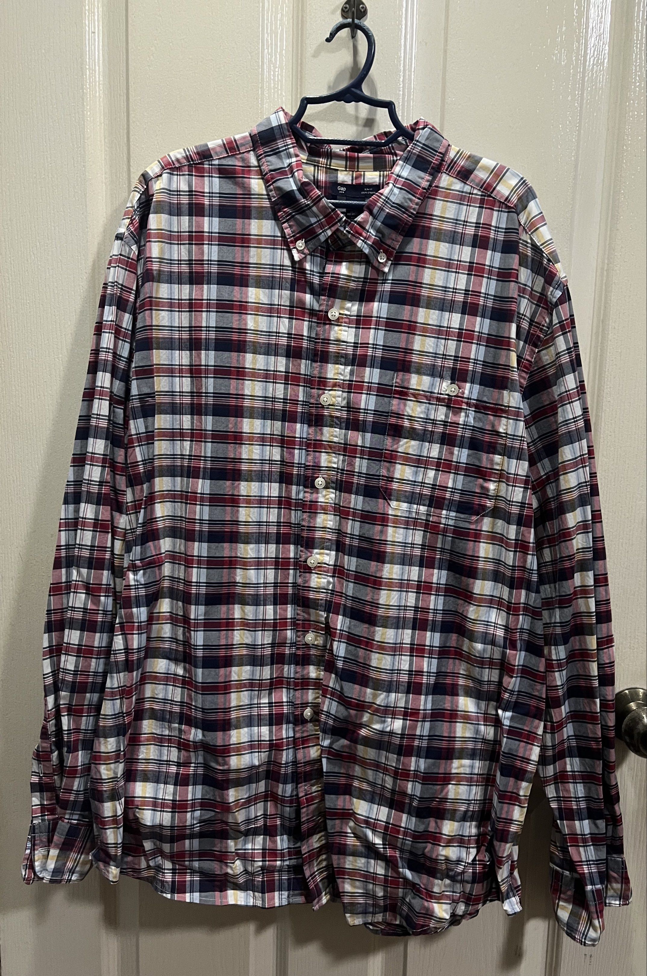 Gap Plaid Long Sleeve Shirt (Category: Tshirts & Polo Shirts ) located in Pasig City. Submitted by titomarc (Listing ID 1417760632, Image 1). Description: - Gap long sleeve shirt - Plaid pattern - Button-down front - Chest pocket - Buttoned cuffs - Classic collar - Slim fit - Colors: Red, white, blue, yellow - Casual, everyday wear.