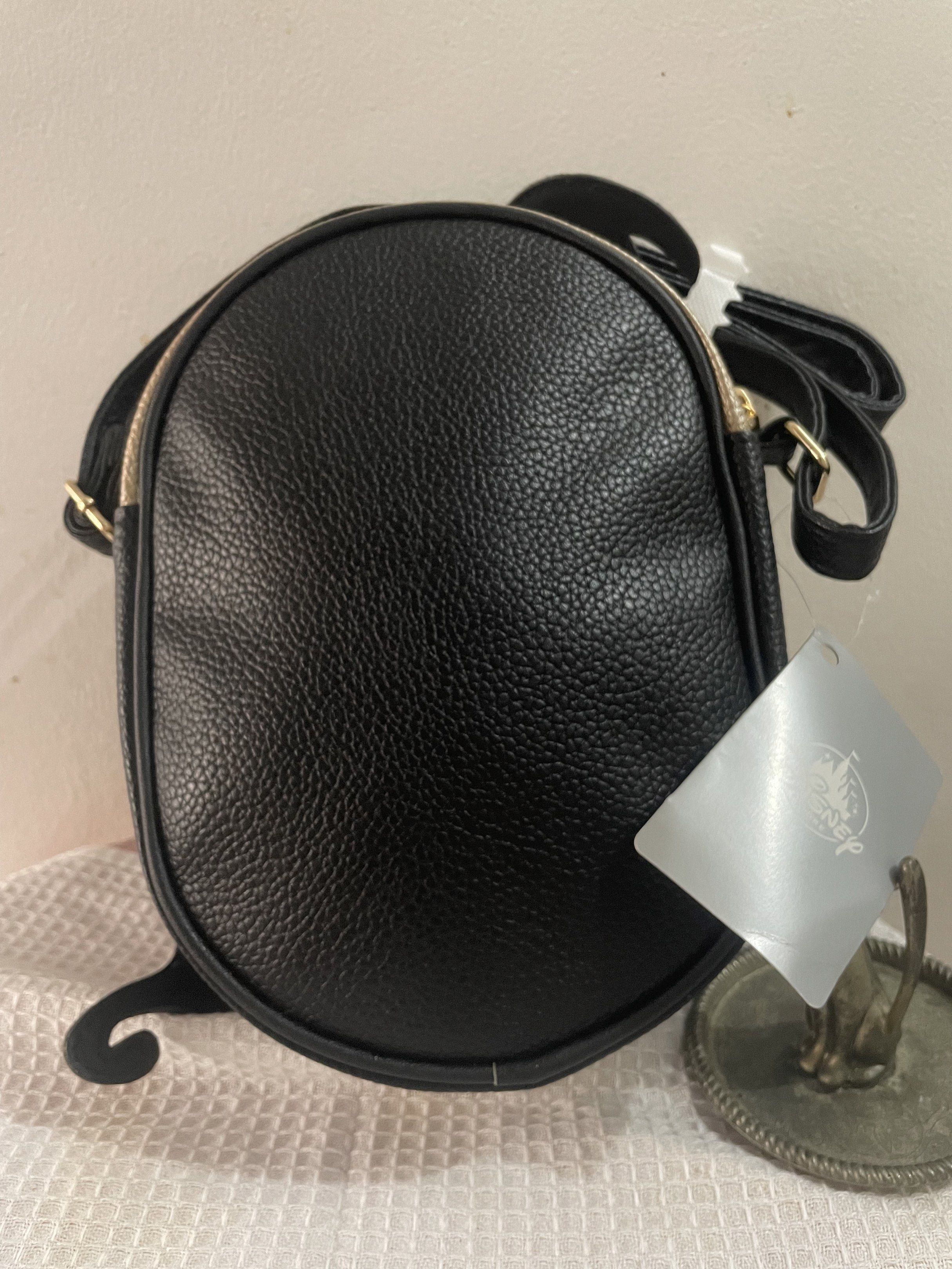 Genie Aladin Disney Sling Bag (Category: Other Babies Going Out Needs) located in Pasig City. Submitted by lilhermes (Listing ID 1417652613, Image 2). Description: Wide: 6.5 inches Height: 9 inches Fit phone .