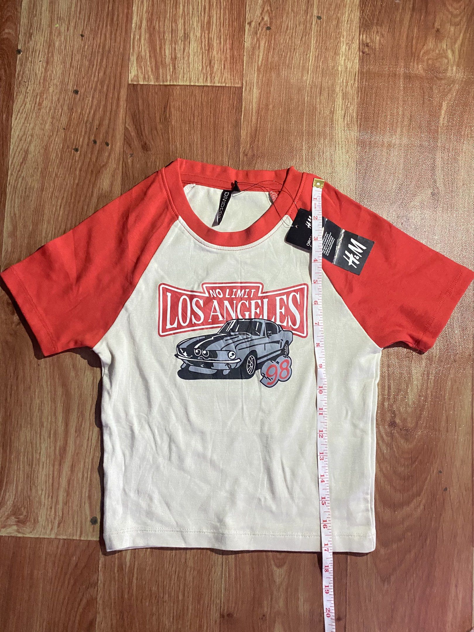 H&M Los Angeles Graphic Tee (Category: Others Tops) located in Rizal. Submitted by robert015 (Listing ID 1417631526, Image 3). Description: Branded Bangladesh Size M on Tag Stretchable See picture for reference on dimensions 📍Taytay Rizal.