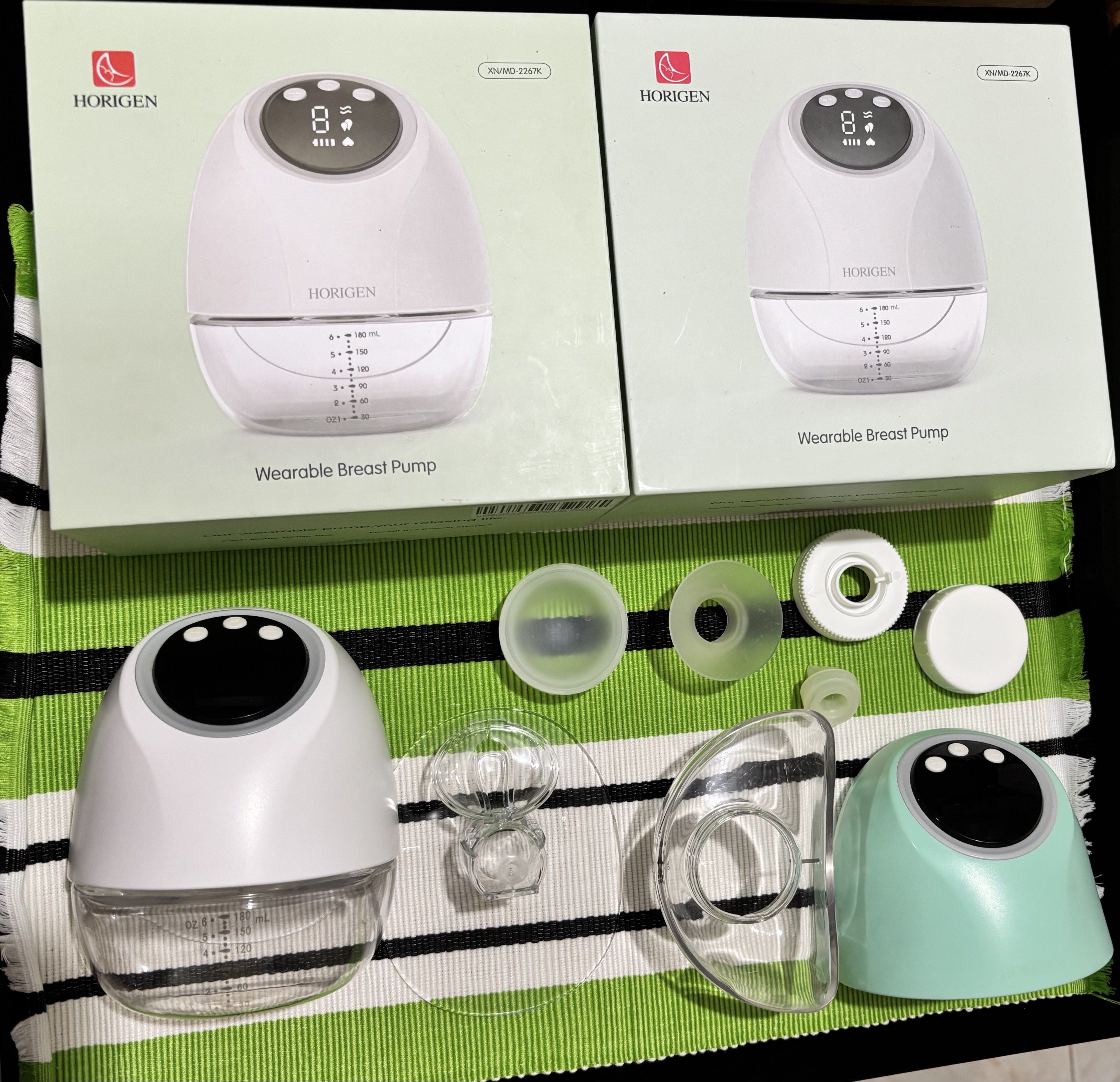 Horigen Wearable Breast Pump (Category: Breastfeeding & Bottle Feeding) located in Butuan. Submitted by ronapreloveditems (Listing ID 1417752899, Image 1). Description: - Horigen wearable breast pump. - Includes all parts shown in the images. - Features milk collection bottles and accessories. - 6oz capacity. - Digital display for easy monitoring. - Complete and ready to use..