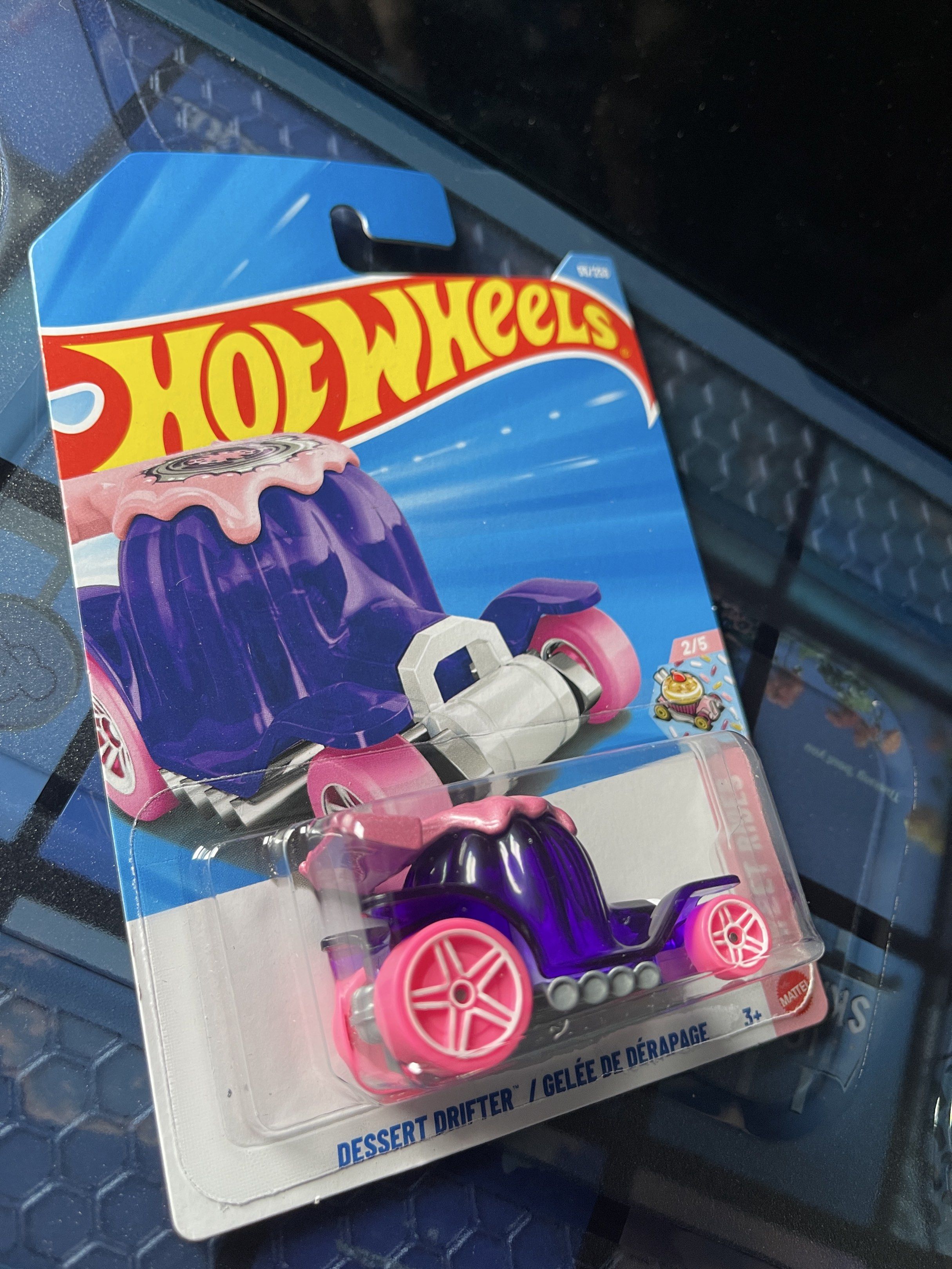 Hot Wheels Dessert Drifter Sweet Rides (Category: Vehicle & Diecast Models) located in Quezon City. Submitted by ccgem (Listing ID 1417678998, Image 2). Description: - Hot Wheels Dessert Drifter - Sweet Rides series - Unique dessert-themed design - Purple body with pink wheels - Part of the 2/5 collection.