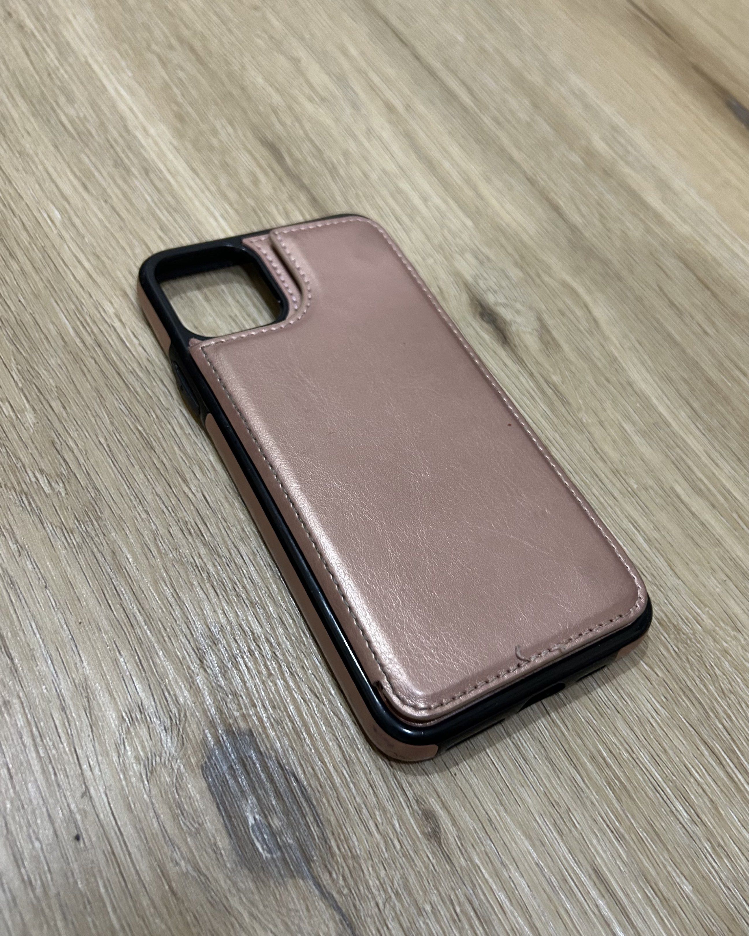 iPhone 11 Pro Max Leather Case | Book Type | Flip Case | Card Slot (Category: Cases & Sleeves) located in Binan City. Submitted by supanovaaa (Listing ID 1417604233, Image 2). Description: - Rose gold color - Comes w/ 3 card slots - 2 magnet closures for safety Freebie for buying any ₱ 400+ item.