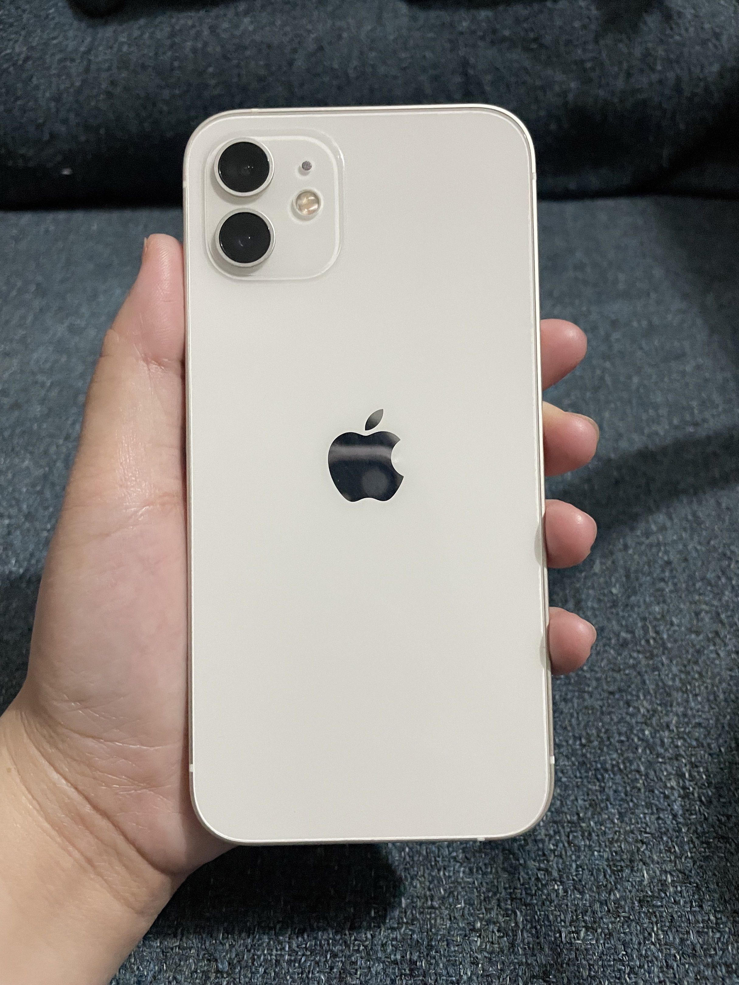 iPhone 12 (Category: iPhone 12 Series) located in Manila. Submitted by minienicd01552 (Listing ID 1417801943, Image 2). Description: iPhone 12 64gb 82% battery health No dents and scratches Tempered lang po may crack and bubbles No box No charger.