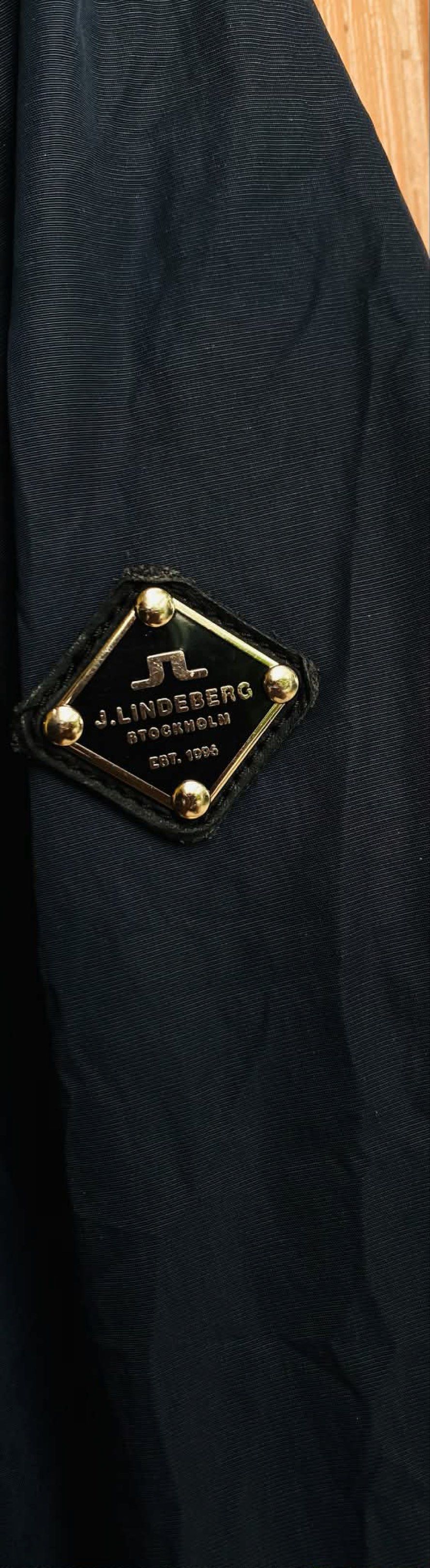 J. Lindeberg Travis 42 Sports Nylon Jacket (Category: Coats, Jackets and Outerwear) located in Digos. Submitted by thrifthed.ph (Listing ID 1417639177, Image 3). Description: - Navy blue J. Lindeberg jacket - Model: Travis 42 Sports Nylon -Brandnew condi -with hangtag -Med fit large -dimes:21.5/28 -no issue -solid condi -solid colorate -cl:10/10 -complete tags -authentic -suitable for picky buyer - no return no exchange - Zip-up front - Ribbed cu