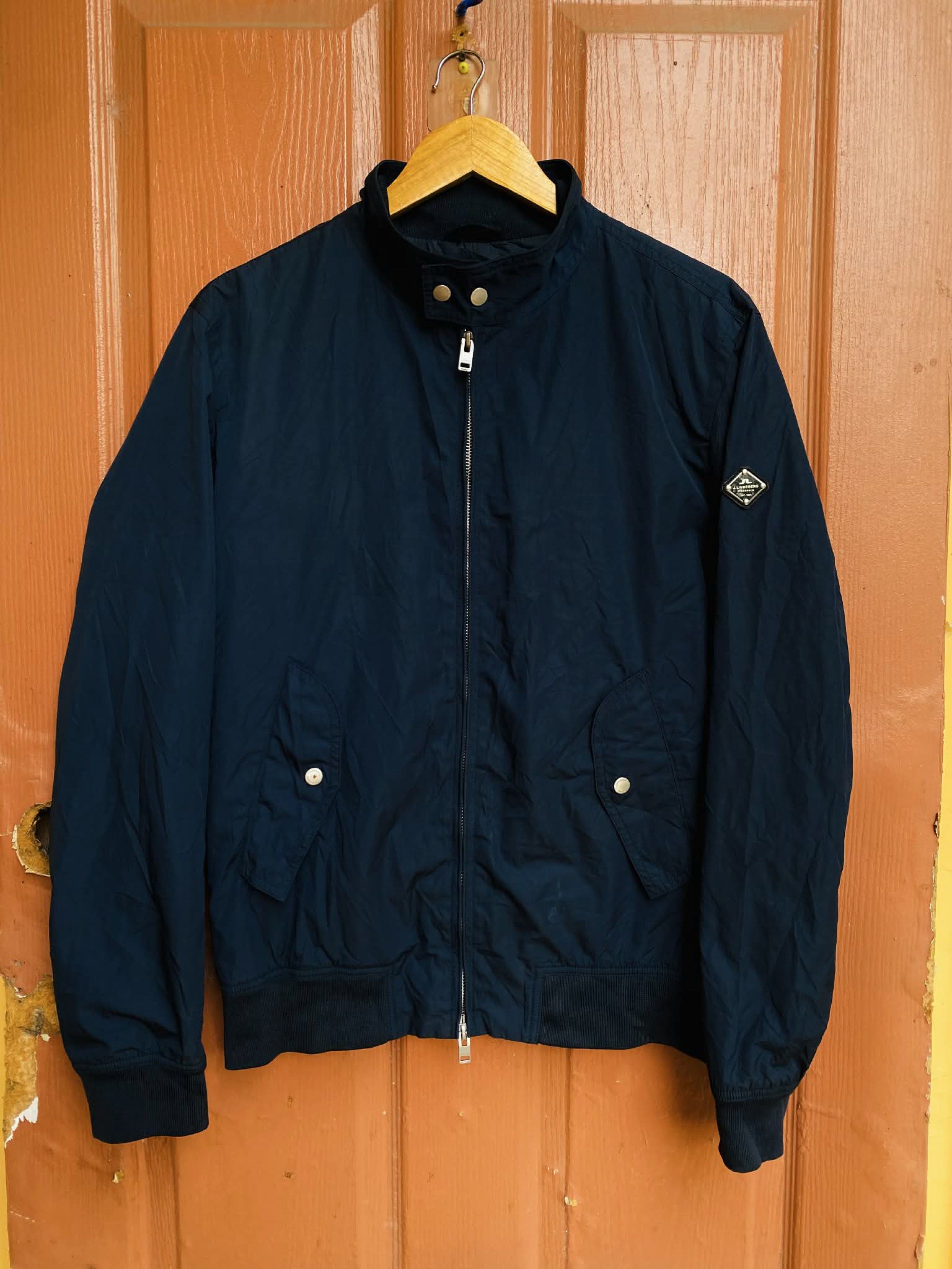 J. Lindeberg Travis 42 Sports Nylon Jacket (Category: Coats, Jackets and Outerwear) located in Digos. Submitted by thrifthed.ph (Listing ID 1417639177, Image 2). Description: - Navy blue J. Lindeberg jacket - Model: Travis 42 Sports Nylon -Brandnew condi -with hangtag -Med fit large -dimes:21.5/28 -no issue -solid condi -solid colorate -cl:10/10 -complete tags -authentic -suitable for picky buyer - no return no exchange - Zip-up front - Ribbed cu