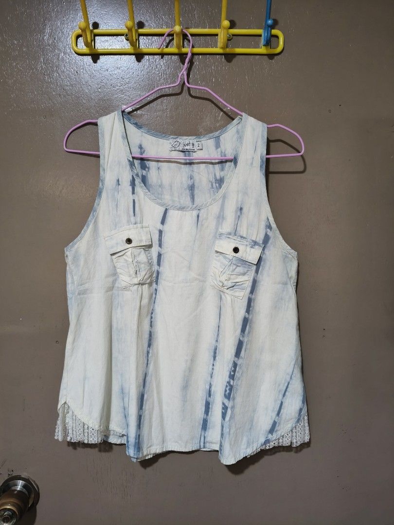Just G. Tie-dye Tank Top Size 2 (Category: Sleeveless) located in Quezon City. Submitted by miss.len (Listing ID 1417626889, Image 1). Description: - Just G. tank top - Unique tie-dye design - Size 2 - Comfortable fabric - Features two front pockets - Lace detail at the bottom - Perfect for casual wear.