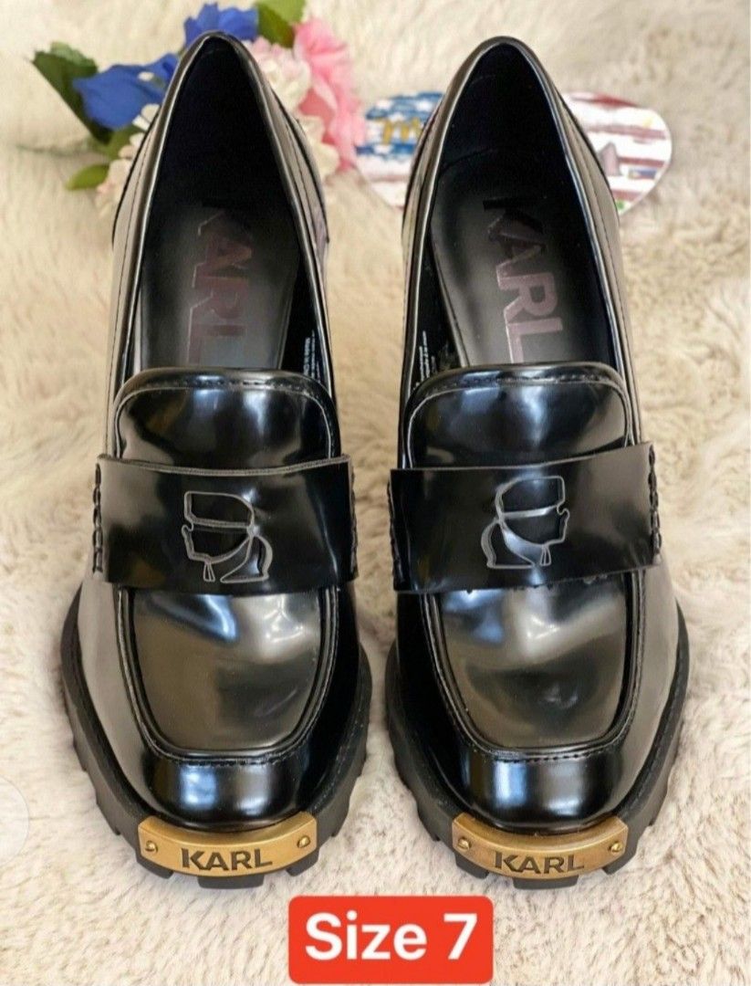 Karl Lagerfeld Black Heels Size 7 (Category: Heels) located in Bulacan. Submitted by fenph2021 (Listing ID 1417810526, Image 2). Description: - Karl Lagerfeld black heels - Size: 7 - Features: - Chunky heel orig price - Platform sole - Glossy finish - Gold-colored accent with brand logo - Design: Loafer-style upper last price posted add 100 for SF both in US orig price 8,700 bago !never been used ! sinukat lang ! maliit saken .