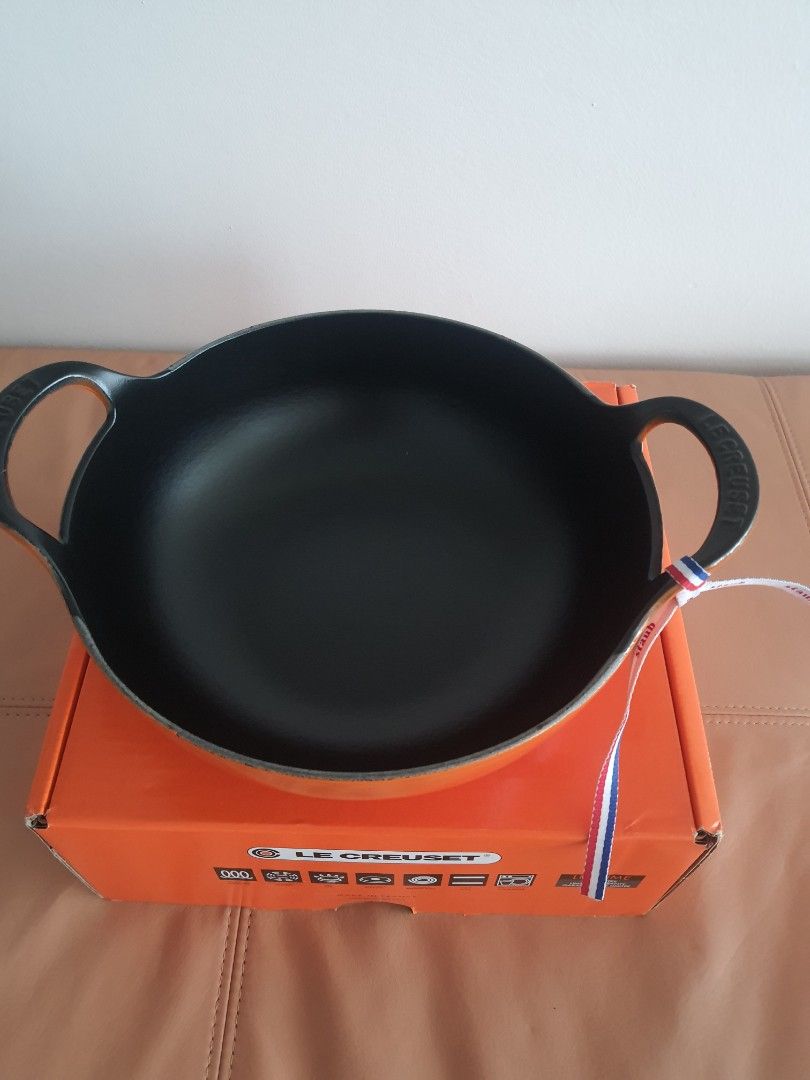 Le Creuset Cast Iron Balti in Flame (Category: Cookware & Accessories) located in Mandaluyong City. Submitted by shark198 (Listing ID 1417666041, Image 2). Description: - Le Creuset cast iron balti pan - Vibrant orange exterior, classic black interior - Features two handles - Made in France - Comes with original Le Creuset box never used it. i ordered cerise red color but received flame orange. since it came from US, return is difficult. so selli