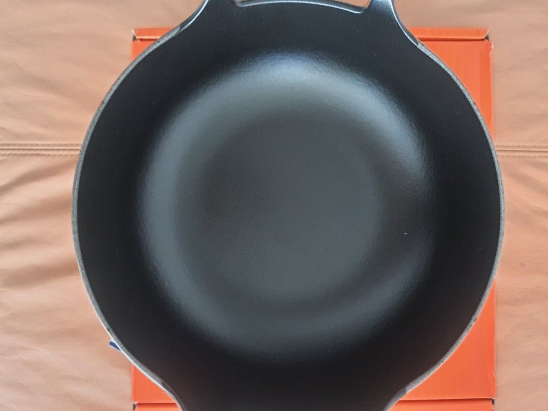 Le Creuset Cast Iron Balti in Flame (Category: Cookware & Accessories) located in Mandaluyong City. Submitted by shark198 (Listing ID 1417666041, Image 3). Description: - Le Creuset cast iron balti pan - Vibrant orange exterior, classic black interior - Features two handles - Made in France - Comes with original Le Creuset box never used it. i ordered cerise red color but received flame orange. since it came from US, return is difficult. so selli