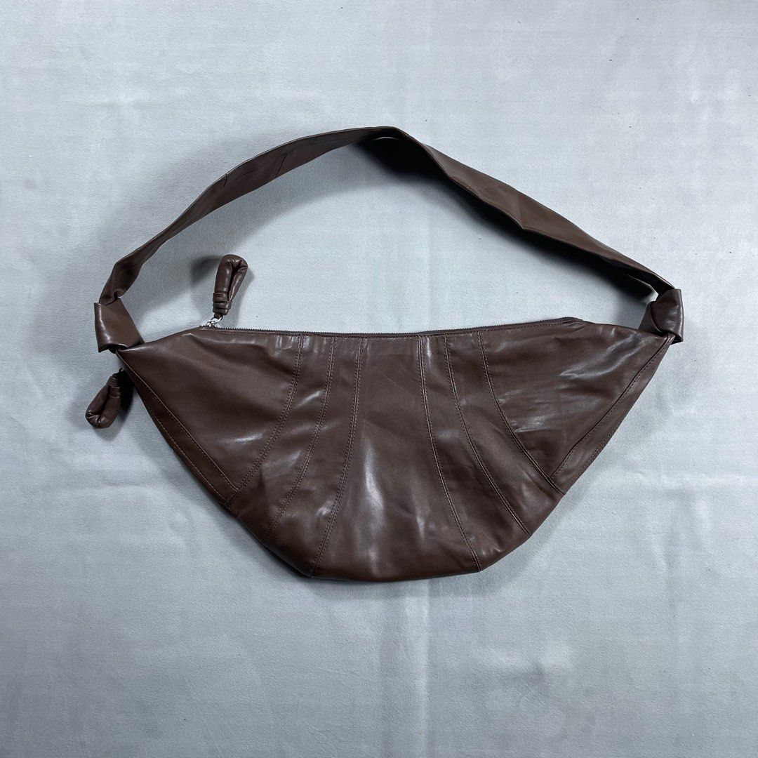 LEMAIRE LARGE CROISSANT ROASTED PECAN (Category: Luxury Bags & Wallets) located in Manila. Submitted by revise.ph_ (Listing ID 1417805755, Image 1). Description: LEMAIRE LARGE CROISSANT ROASTED PECAN Made in SPAIN Dimension Height/Length:11.2 Width:24 Issue:zipper puller inside pocket Price:3,500 Free Shipping via Jnt.
