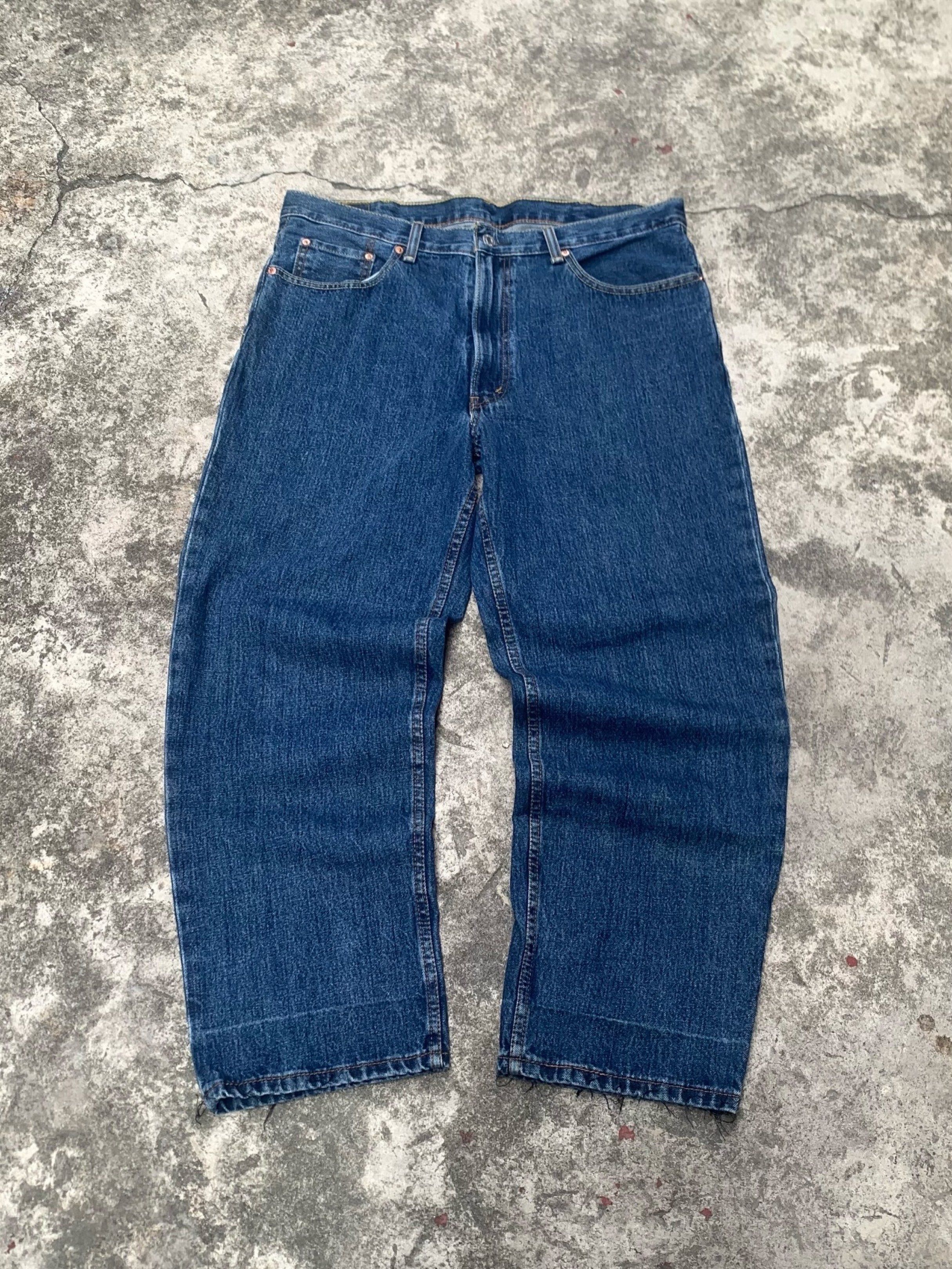 Levi's 550 Relaxed Fit Jeans (Category: Jeans) located in Balanga. Submitted by seandreiii (Listing ID 1417714270, Image 1). Description: - Levi's 550 jeans - Relaxed fit - Medium-wash blue denim - Classic five-pocket design - Red Levi's tag on back pocket - Authentic Levi Strauss & Co. - Button and zipper closure.