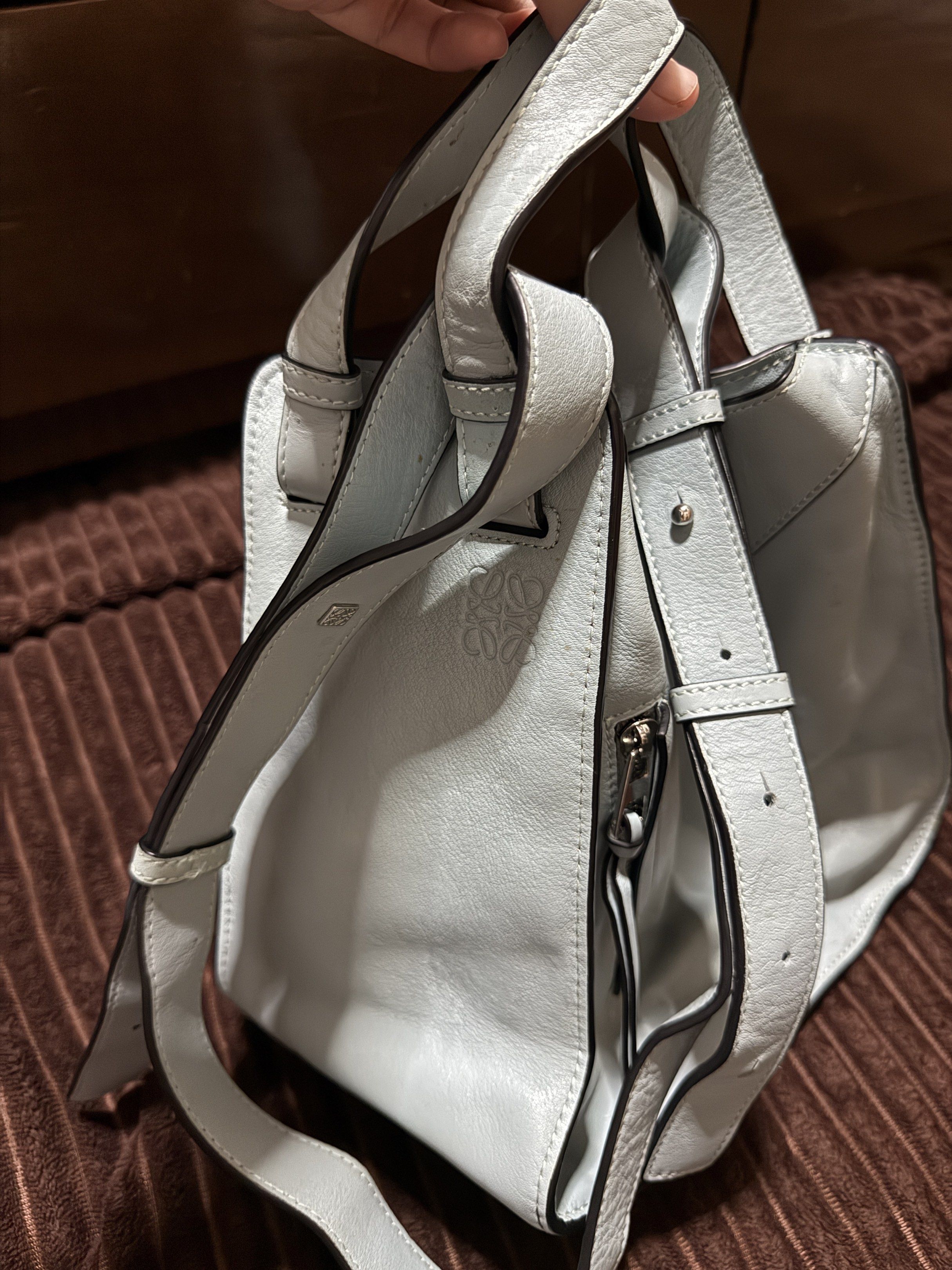Loewe Hammock Bag - Light Blue (Category: Luxury Bags & Wallets) located in Tagbilaran City. Submitted by yvettecurso (Listing ID 1417663532, Image 2). Description: - Authenticity: Not guaranteed. No proof of purchase or authentication available. However, based on the quality, stitching, materials, and logo, the item appears authentic. Please manage expectations and feel free to have it authenticated. - Light Blue Color - Unique Geometric Design 