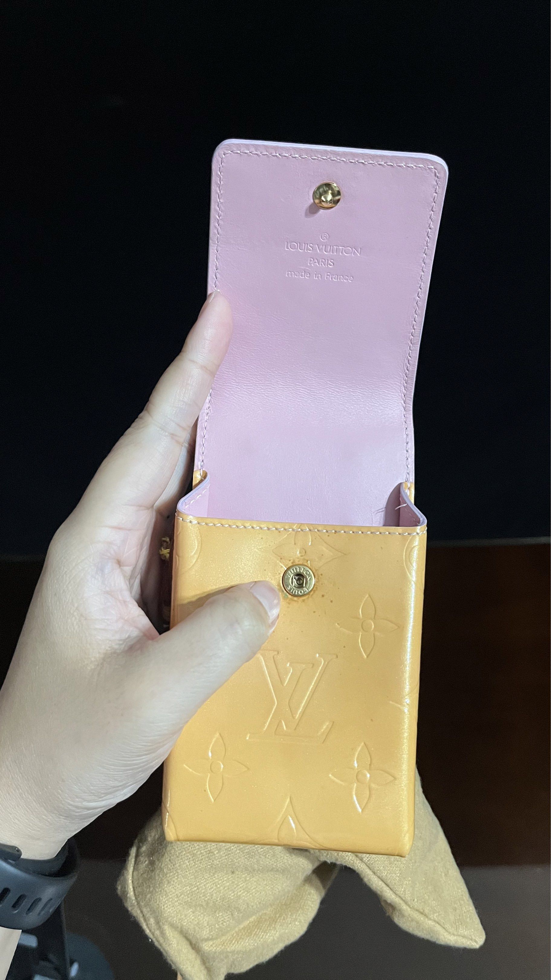 Louis Vuitton Vernis Cigarette Case (Category: Luxury Bags & Wallets) located in Pasig City. Submitted by klippy (Listing ID 1417703812, Image 3). Description: - Authentic LV Vernis case - Detachable strap included - Comes with a dust bag - Contrasting pink interior - Snap closure - From Sonu Vintage on IG - Decluttering, price negotiable!.
