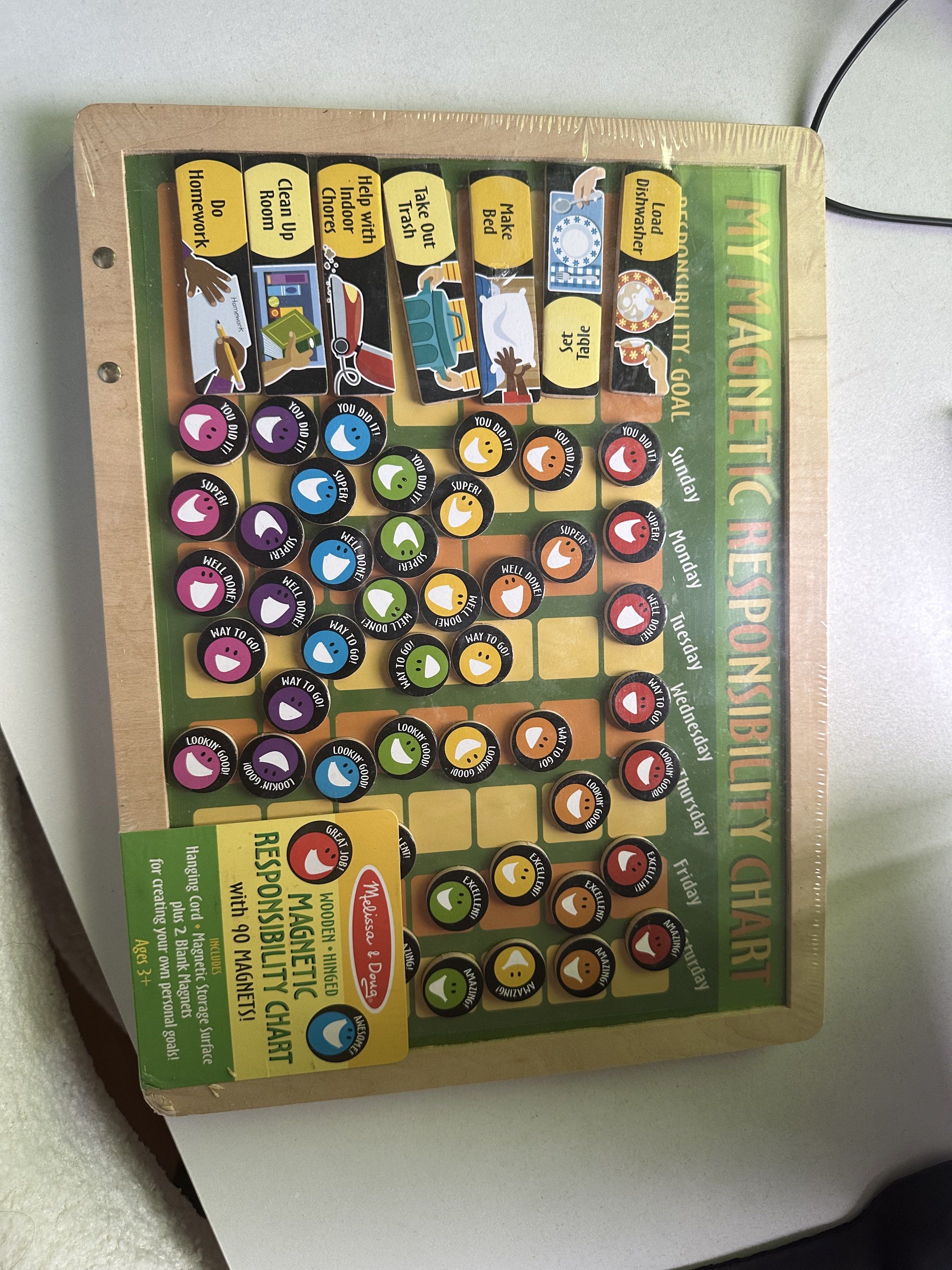 Melissa & Doug Magnetic Responsibility Chart (Category: Infant Playtime) located in Quezon City. Submitted by honeyhon3y (Listing ID 1417692855, Image 2). Description: - Melissa & Doug Magnetic Responsibility Chart - For children aged 3+ - Wooden-framed magnetic chart - Includes task cards and reward magnets - Helps kids build responsibility and good habits - Tracks progress - Brand new, still sealed.