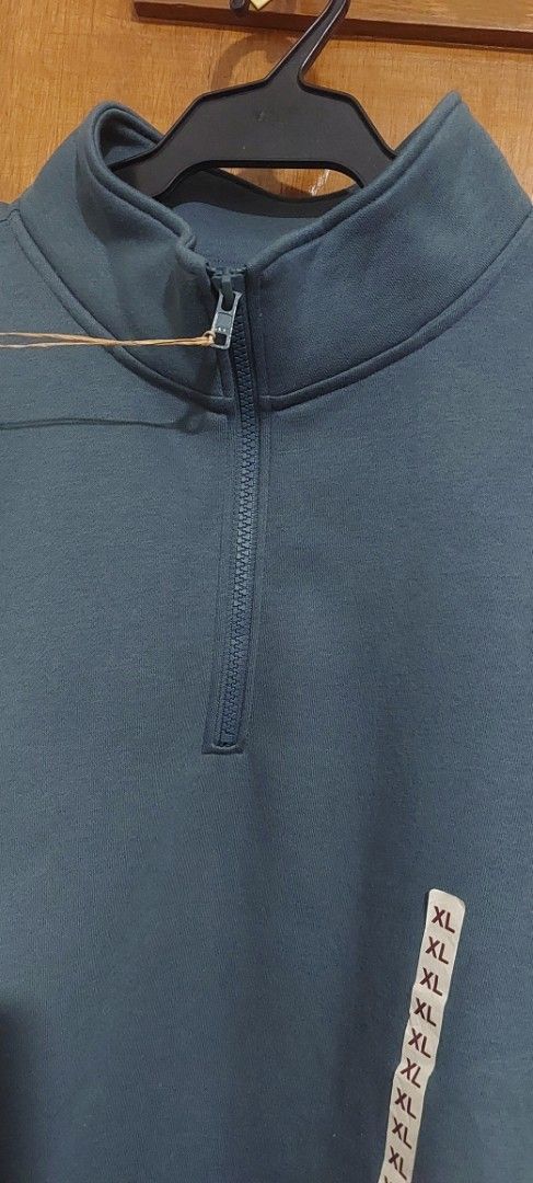 MUJI Half Zip Sweatshirt - XL (Category: Coats, Jackets and Outerwear) located in Manila. Submitted by as_declutter (Listing ID 1417755347, Image 3). Description: - MUJI half-zip sweatshirt - Color: Smoky Blue - Size: XL (Mens size) - Fabric: Comfortable, light brushed sweatshirt material - Features: Half zip, high collar - Condition: New with tags - Original Price: 188 HKD - bought from Macau RFS: bought it as a gift but receiver did not like it
