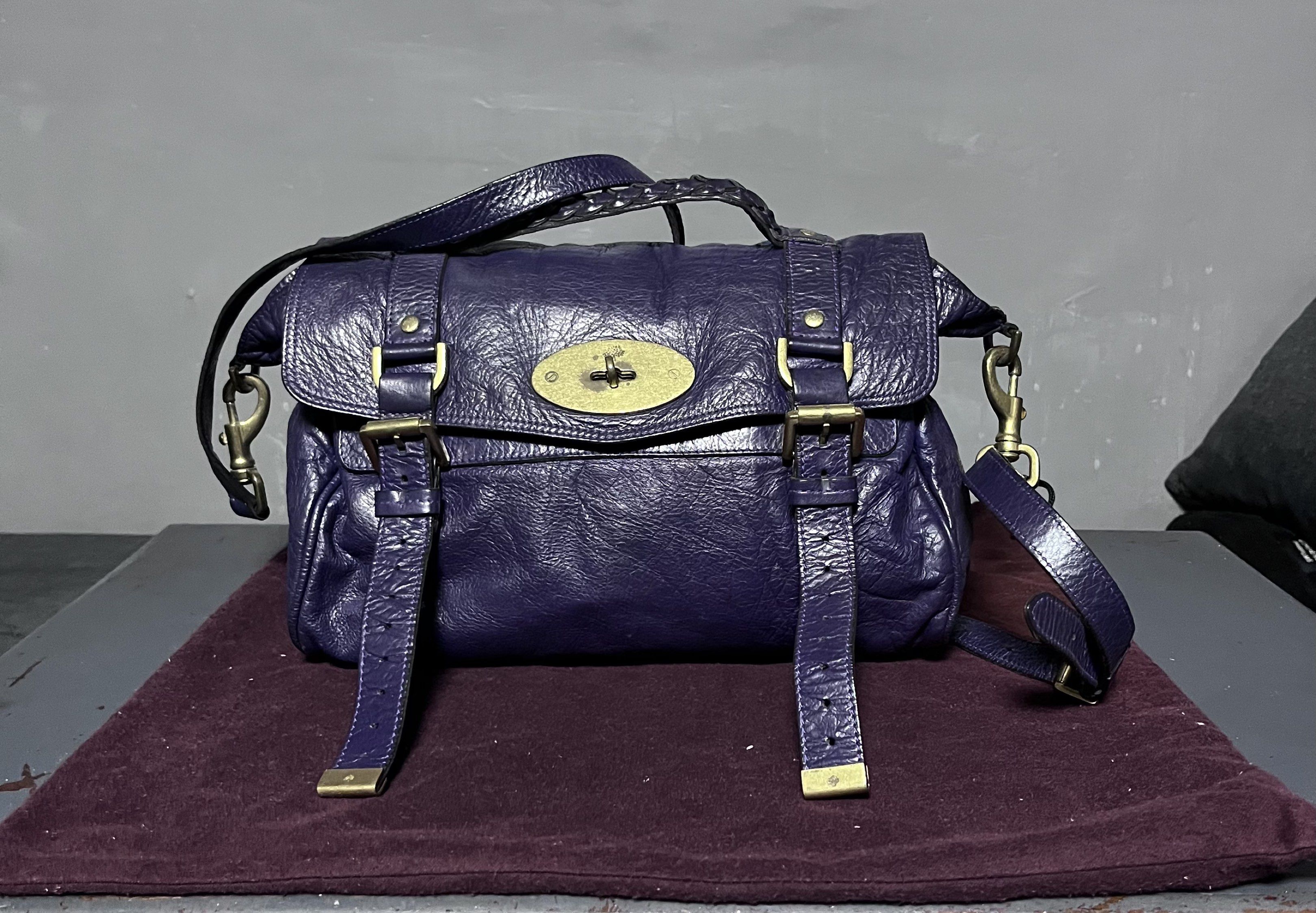 Mulberry Alexa Satchel Bag - Violet (Category: Luxury Bags & Wallets) located in Quezon City. Submitted by raycruz55 (Listing ID 1417709099, Image 1). Description: - AUTHENTIC Mulberry Alexa Satchel Bag - Color: Violet - Complete with DUST BAG & PAPERS - Condition: Lightly Used; no major flaws, the leather just needs a bit of cleaning (see last picture).