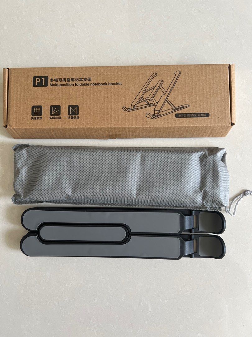 multi-position foldable notebook bracket (Category: Laptop Bags & Sleeves) located in Singapore. Submitted by aaalice999 (Listing ID 1417633603, Image 1). Description: .