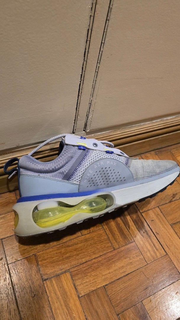 Nike Air Max 2021 Sneakers (Category: Sneakers) located in Pasig City. Submitted by johnflan (Listing ID 1417803335, Image 2). Description: - Nike Air Max 2021 - Size: US 11, UK 10, EUR 45, CM 29 - Color: Grey and Blue - Features: Visible Air Max cushioning, mesh upper - Design: Lace-up closure with heel pull tab - Condition: Excellent.