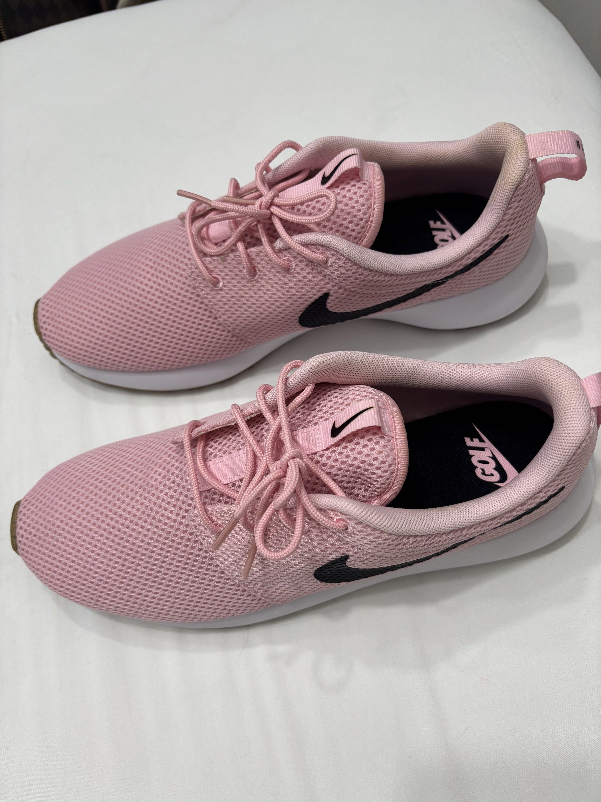 Nike Roshe Golf Shoes - Pink (Category: Sneakers) located in San Fernando. Submitted by mhedkm (Listing ID 1417766922, Image 1). Description: - Pink Nike Roshe golf shoes - Black Nike swoosh - "GOLF" printed on insole - White sole with brown bottom - Pink laces - Pink pull tab at heel Size - US 9.5 .