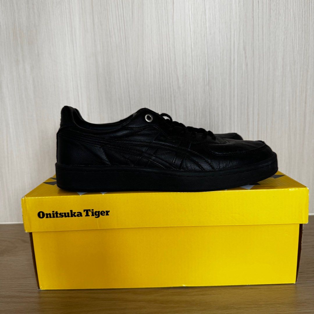 Onitsuka Tiger GSM SD Sneakers - Size 39.5 (Category: Sneakers) located in Singapore. Submitted by corlissell (Listing ID 1399362532, Image 3). Description: Onitsuka Tiger GSM SD Sneakers Authenticity Guaranteed Black Leather Size 39.5 Gently worn a few times, good condition with soles like display pair Meetups at Mountbatten CC .