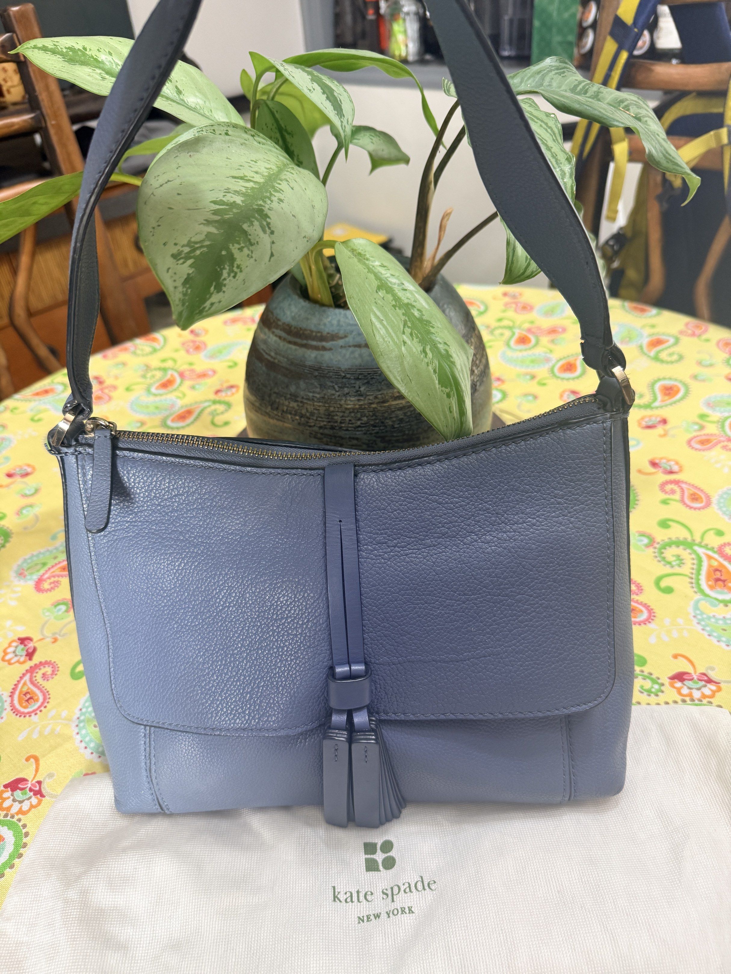 Original Kate Spade Blue Shoulder Bag (Category: Luxury Bags & Wallets) located in Quezon City. Submitted by coco88. (Listing ID 1417665890, Image 2). Description: - Kate Spade shoulder bag - Beautiful blue color - Top zipper closure - Adjustable strap included - Comes with a dust bag - Interior has a small pocket - Stylish flap with tassel detail.