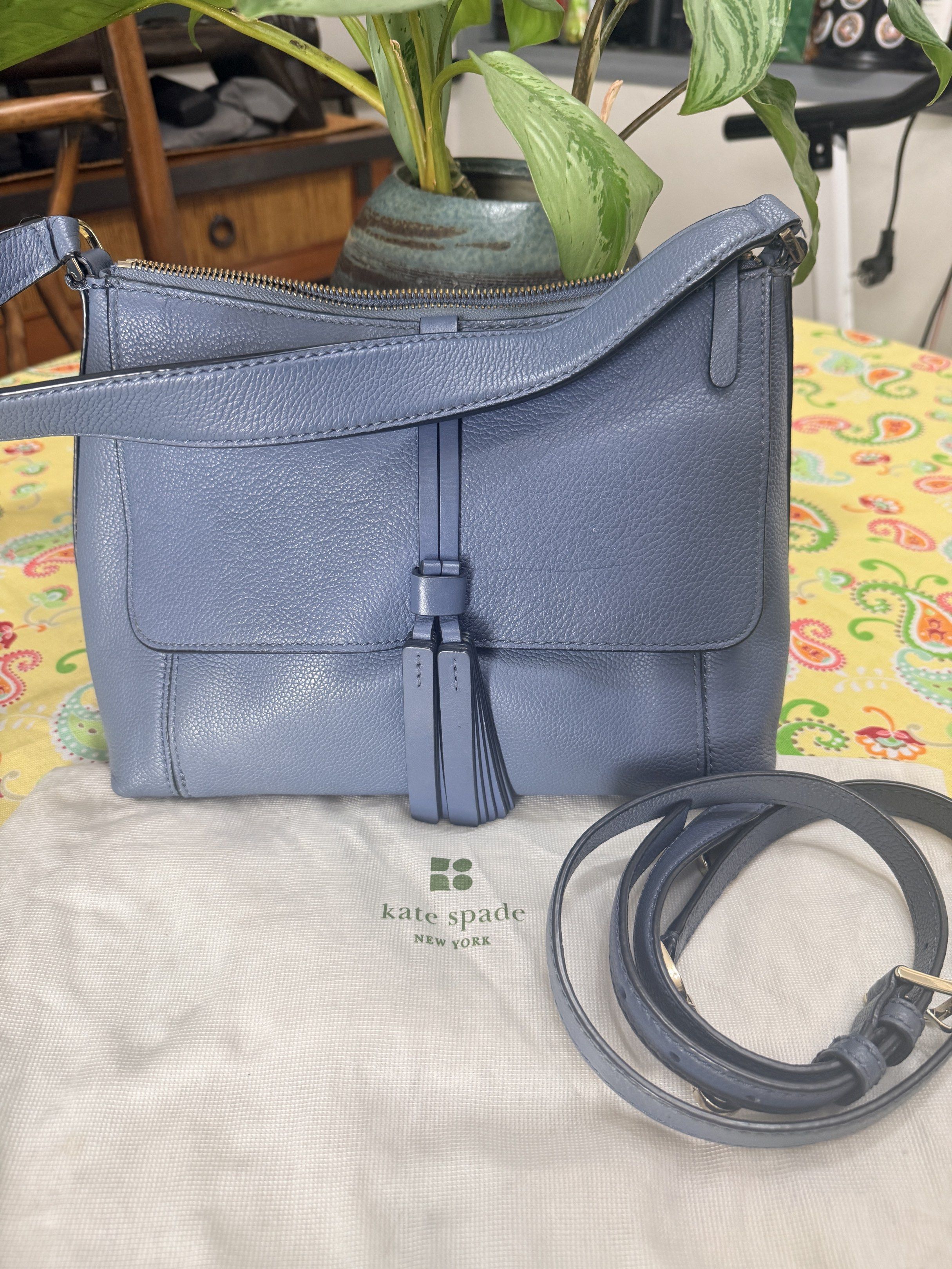 Original Kate Spade Blue Shoulder Bag (Category: Luxury Bags & Wallets) located in Quezon City. Submitted by coco88. (Listing ID 1417665890, Image 3). Description: - Kate Spade shoulder bag - Beautiful blue color - Top zipper closure - Adjustable strap included - Comes with a dust bag - Interior has a small pocket - Stylish flap with tassel detail.