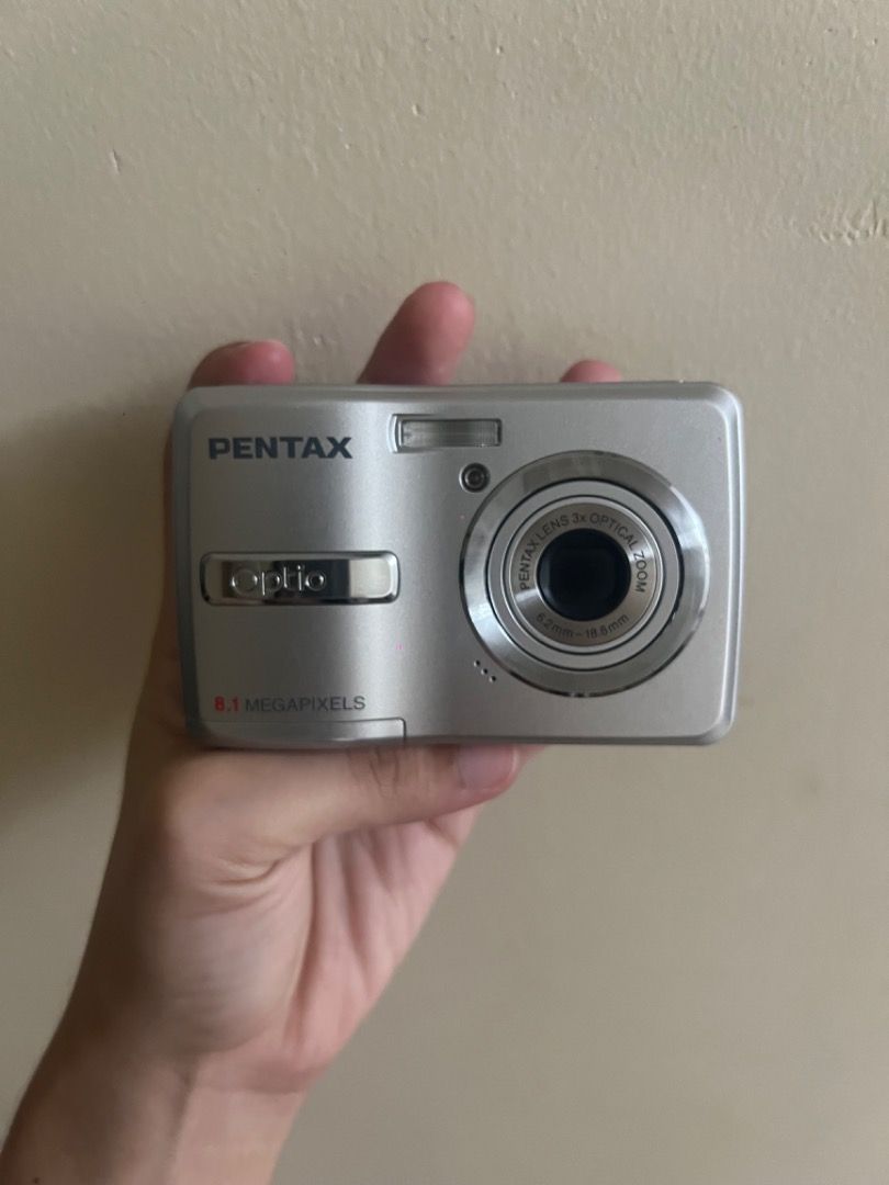 Pentax Optio E40 Retro Digicam (Category: Cameras) located in Quezon City. Submitted by truephoenix_b840df (Listing ID 1417778294, Image 2). Description: Pentax Optio E40 ✨ Retro CCD Digicam | Near Mint 📸 CCD DIGICAM | JAPAN UNIT 🇯🇵 Selling my Pentax Optio E40, near-mint (9.5/10) All functions working. Well kept. • Classic CCD sensor – soft, nostalgic, film-like colors • 8.1MP + 3x optical zoom • Multiple shooting & scene modes — each mode giv
