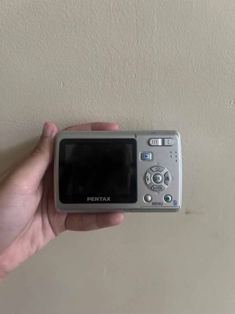 Pentax Optio E40 Retro Digicam (Category: Cameras) located in Quezon City. Submitted by truephoenix_b840df (Listing ID 1417778294, Image 3). Description: Pentax Optio E40 ✨ Retro CCD Digicam | Near Mint 📸 CCD DIGICAM | JAPAN UNIT 🇯🇵 Selling my Pentax Optio E40, near-mint (9.5/10) All functions working. Well kept. • Classic CCD sensor – soft, nostalgic, film-like colors • 8.1MP + 3x optical zoom • Multiple shooting & scene modes — each mode giv