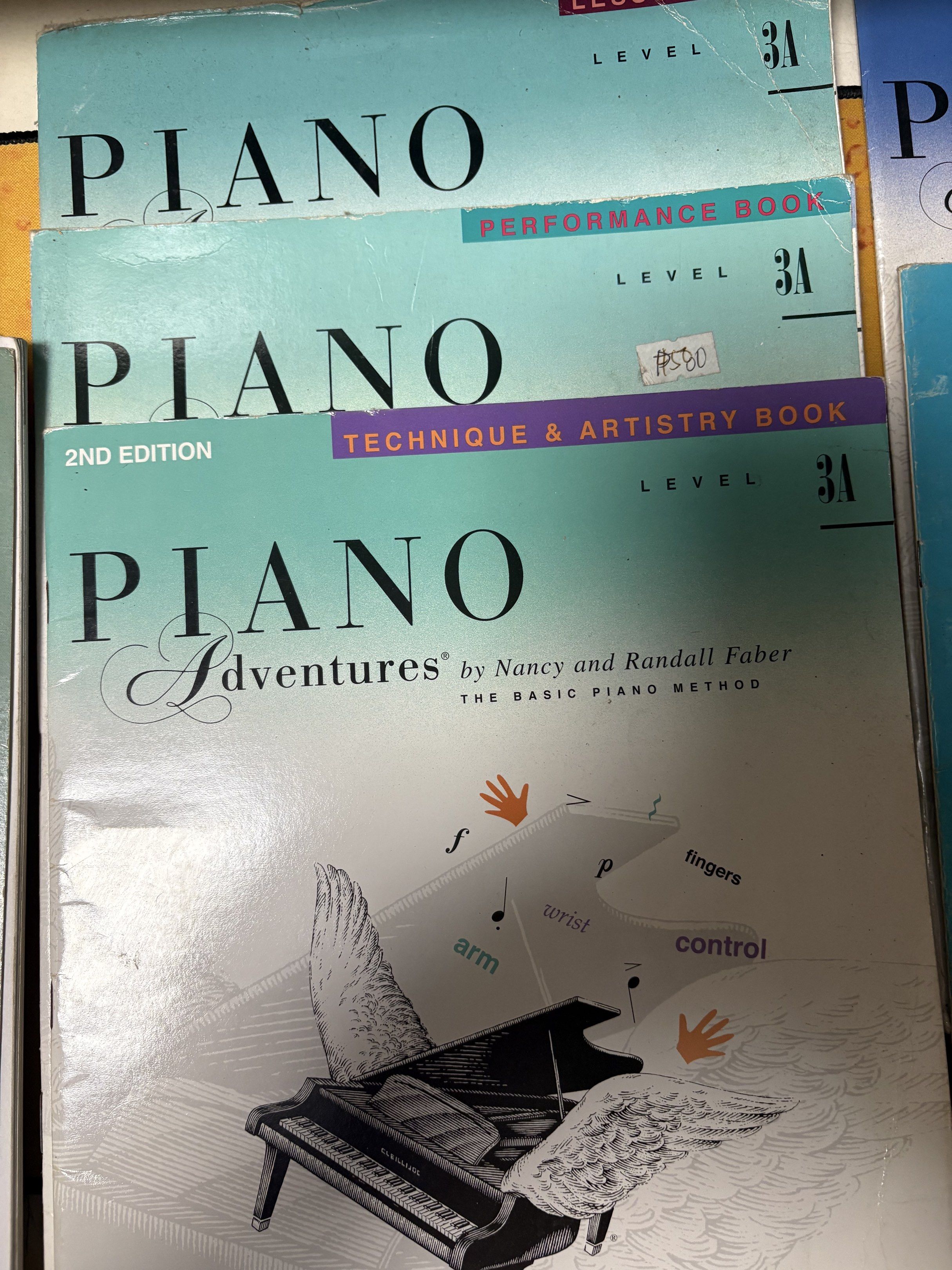 Piano Adventures Lesson Books (Category: Storybooks) located in Pasig City. Submitted by norineph (Listing ID 1417641222, Image 1). Description: Various piano lesson books for different levels. Includes Adult Piano Adventures All-In-One Lesson Book 1, Piano Adventures Level 3A books (Performance and Technique & Artistry), Alfred's Basic Piano Library Prep Course Level B, and PlayTime Piano Hymns Level 5. Also includes an Intro to Music book. Perf