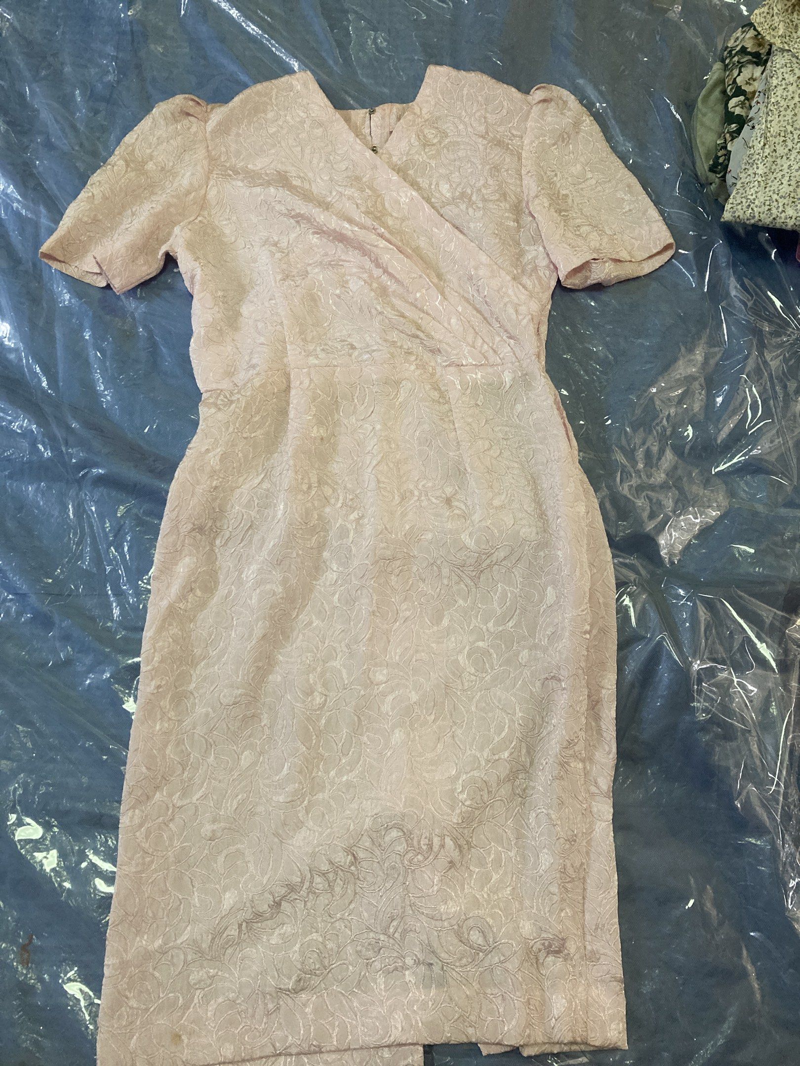Pink Floral Dress (Category: Dresses) located in Caloocan City. Submitted by canne1991 (Listing ID 1417649695, Image 1). Description: - Pink floral dress - Wrap-style bodice - Short sleeves - Fitted silhouette - Knee-length - Back zipper closure - Subtle sheen fabric - Ideal for special occasions.