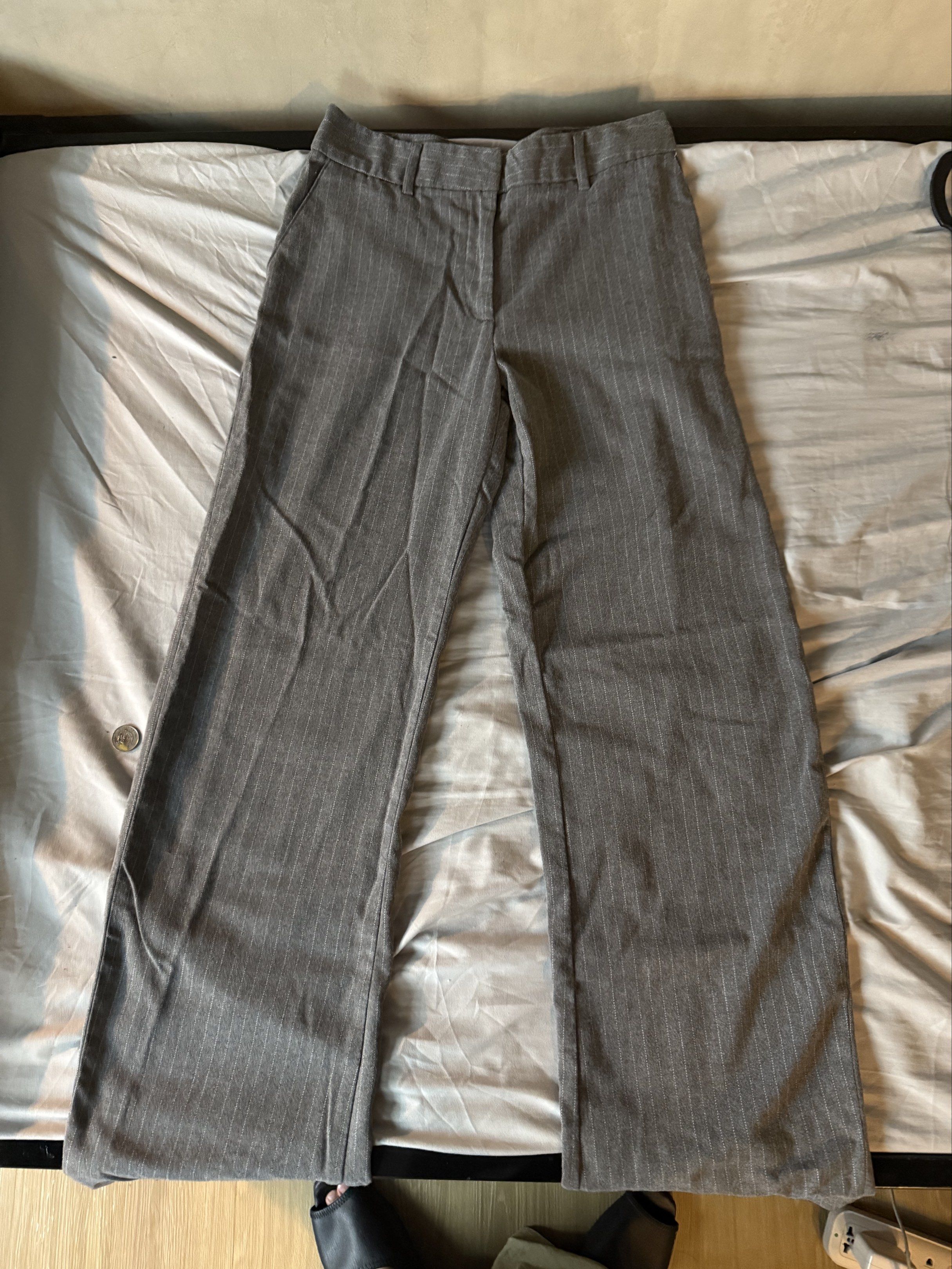 Calliope Pinstripe Gray Trousers (Category: Other Bottoms) located in Quezon City. Submitted by thedanielandre (Listing ID 1417635625, Image 1). Description: Calliope Size S signs of wear at the bottom.