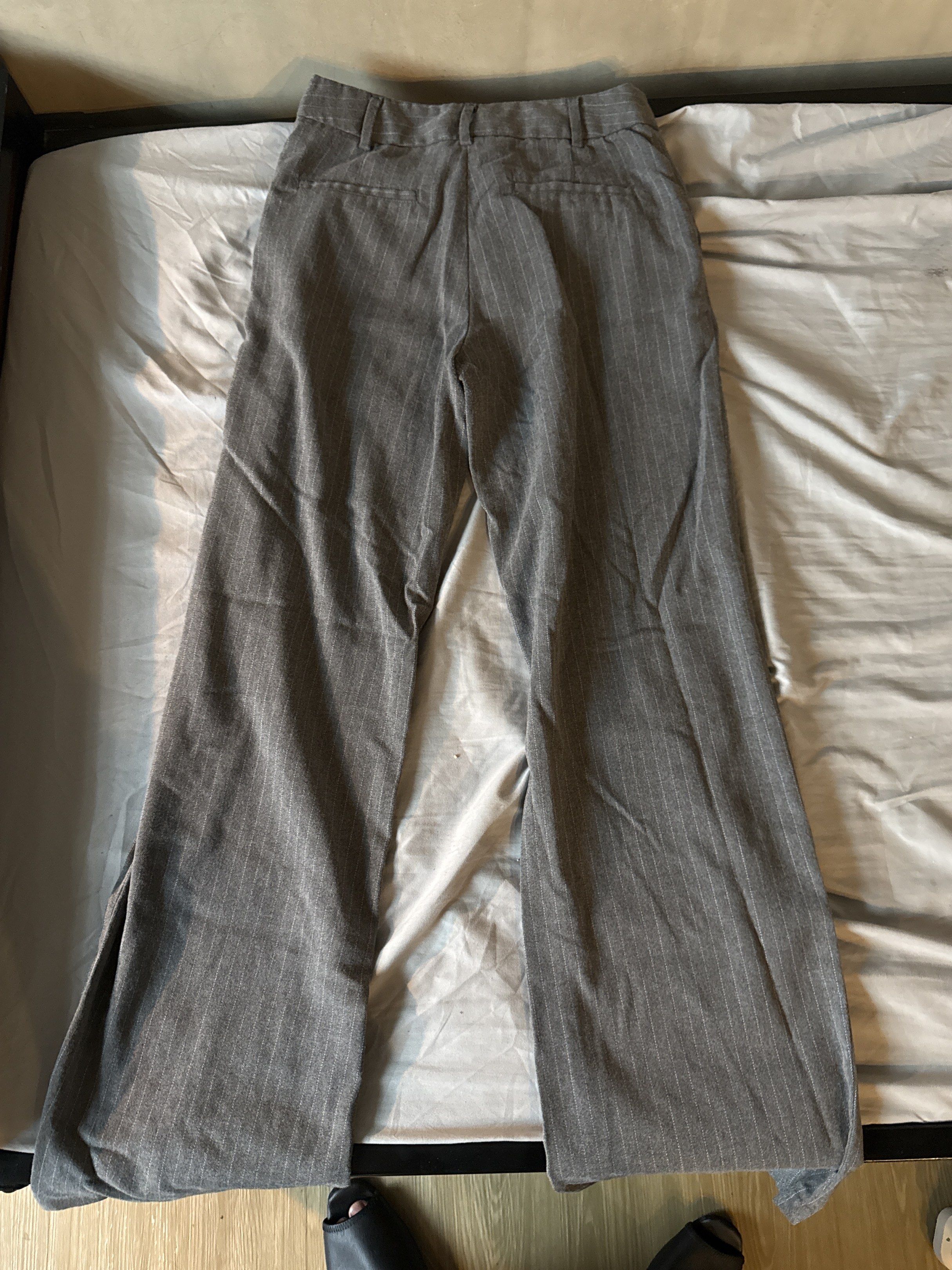 Calliope Pinstripe Gray Trousers (Category: Other Bottoms) located in Quezon City. Submitted by thedanielandre (Listing ID 1417635625, Image 2). Description: Calliope Size S signs of wear at the bottom.