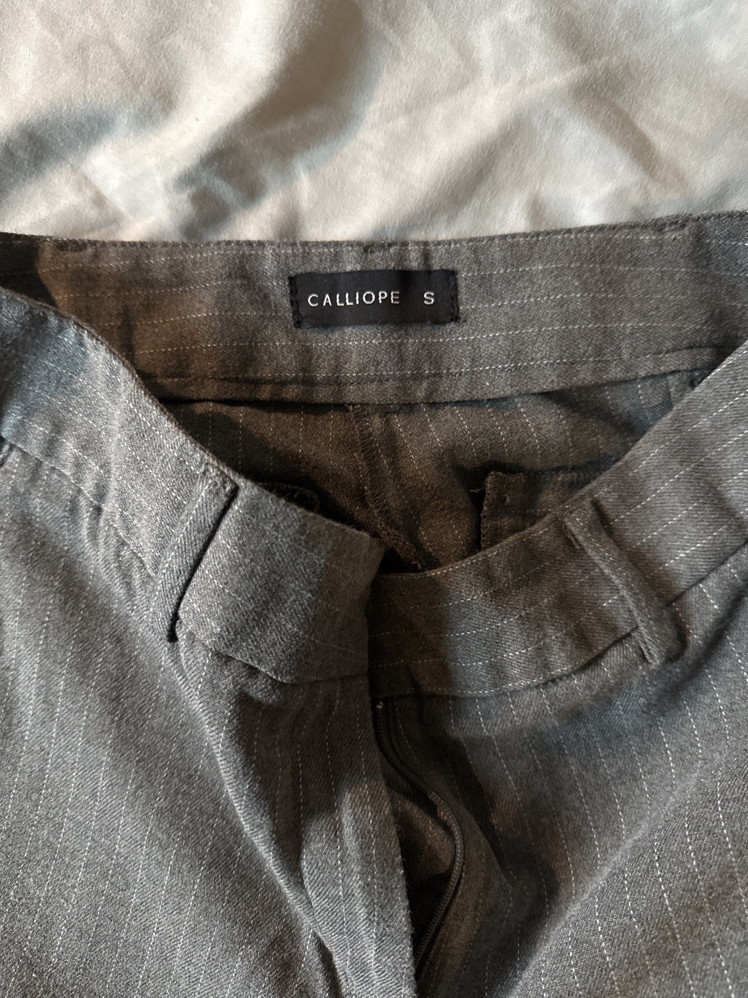 Calliope Pinstripe Gray Trousers (Category: Other Bottoms) located in Quezon City. Submitted by thedanielandre (Listing ID 1417635625, Image 3). Description: Calliope Size S signs of wear at the bottom.