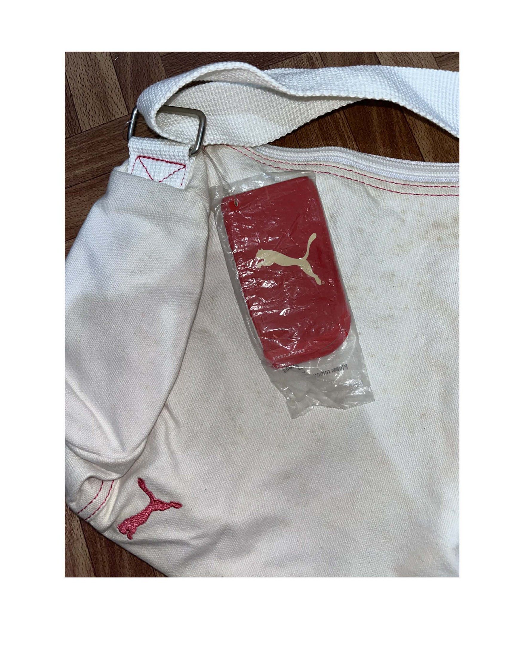 Puma Women's Duffle Bag (Category: Cross-body Bags) located in Quezon City. Submitted by mikkoimon (Listing ID 1417759175, Image 3). Description: Bought from Japan. Condition: ✔ Brand new, never used ✔ Very dusty/dirty due to long storage ✔ No damage.