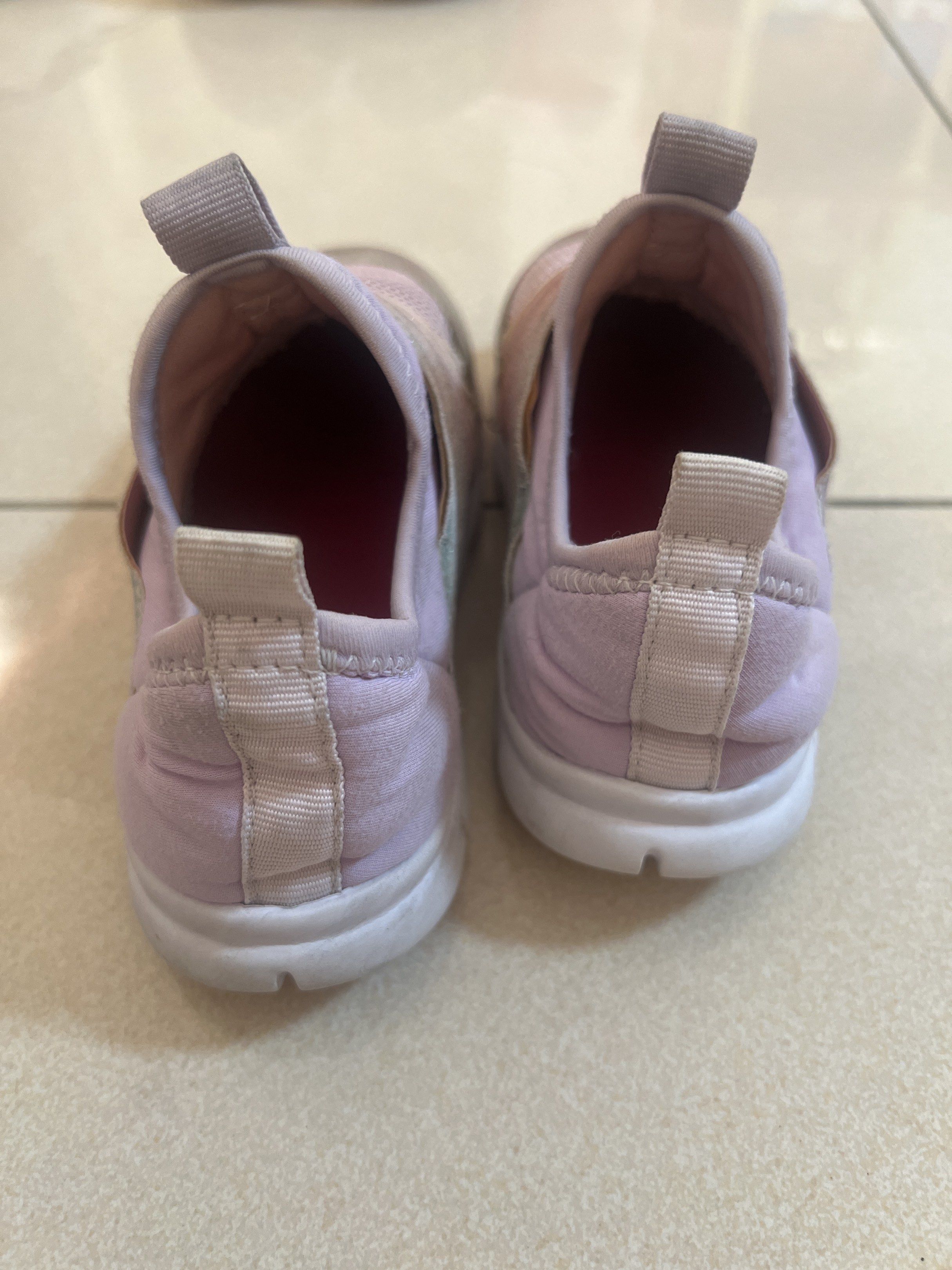 Rainbow Slip-on Shoes Size 25 (Category: Babies & Kids Fashion) located in Quezon City. Submitted by lovedlots (Listing ID 1417703504, Image 3). Description: - Baby slip-on shoes - Pink and iridescent design - Size 25, about 7 in outsole - Pull tab at the back for easy wear - Some wear visible on soles and fabric.