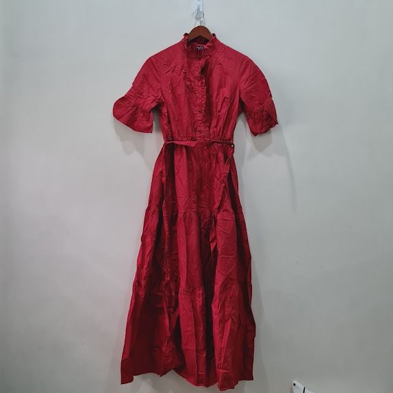 Red Maxi Dress with Ruffle Sleeves (Category: Dresses) located in Marikina City. Submitted by repurpose_studio (Listing ID 1417658090, Image 1). Description: - Elegant red maxi dress - Features a high neckline - Elastic waist for a flattering fit - Flowing tiered skirt - Short sleeves with charming ruffle detailing - Comes with a matching belt - Ideal for special events or everyday wear Notes: - Colors may appear different due to lighting and pho