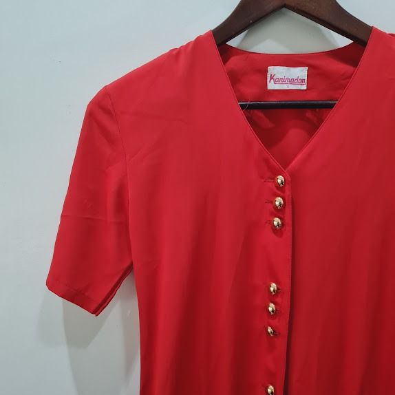 Red Midi Dress with Gold Buttons (Category: Dresses) located in Marikina City. Submitted by repurpose_studio (Listing ID 1417653393, Image 2). Description: - Red midi dress - V-neckline - Short sleeves - Gold button detail - Two front pockets - Smooth fabric - Classic style Notes: - Colors may appear different due to lighting and photo conditions - No returns, exchanges and refunds #officeoutfit #dateoutfit #churchdress #formalwear #smartcasual #