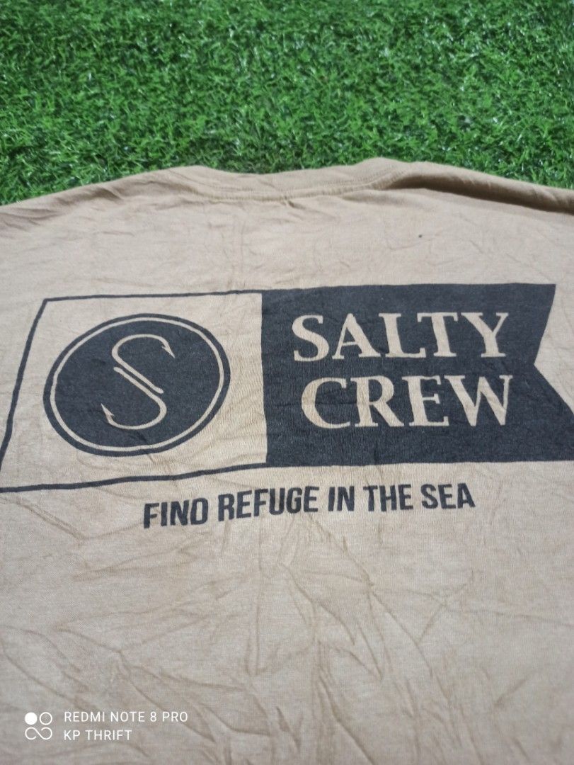 Salty Crew Medium Standard T-Shirt (Category: Tshirts & Polo Shirts ) located in Pasig City. Submitted by goofyflip (Listing ID 1417776111, Image 3). Description: - Salty Crew t-shirt - Size: Medium - Color: Neutral - Features Salty Crew logos (front and back) - Crew neck design - Comfortable material - Ideal for casual wear.
