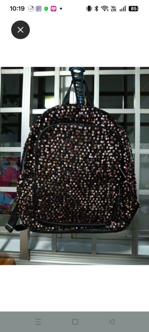 Sequin Backpack (Category: Backpacks) located in Singapore. Submitted by yeosng11 (Listing ID 1417713746, Image 1). Description: - Black sequin backpack - Top handle - Adjustable straps - Adds sparkle to your everyday look - Perfect for carrying essentials.