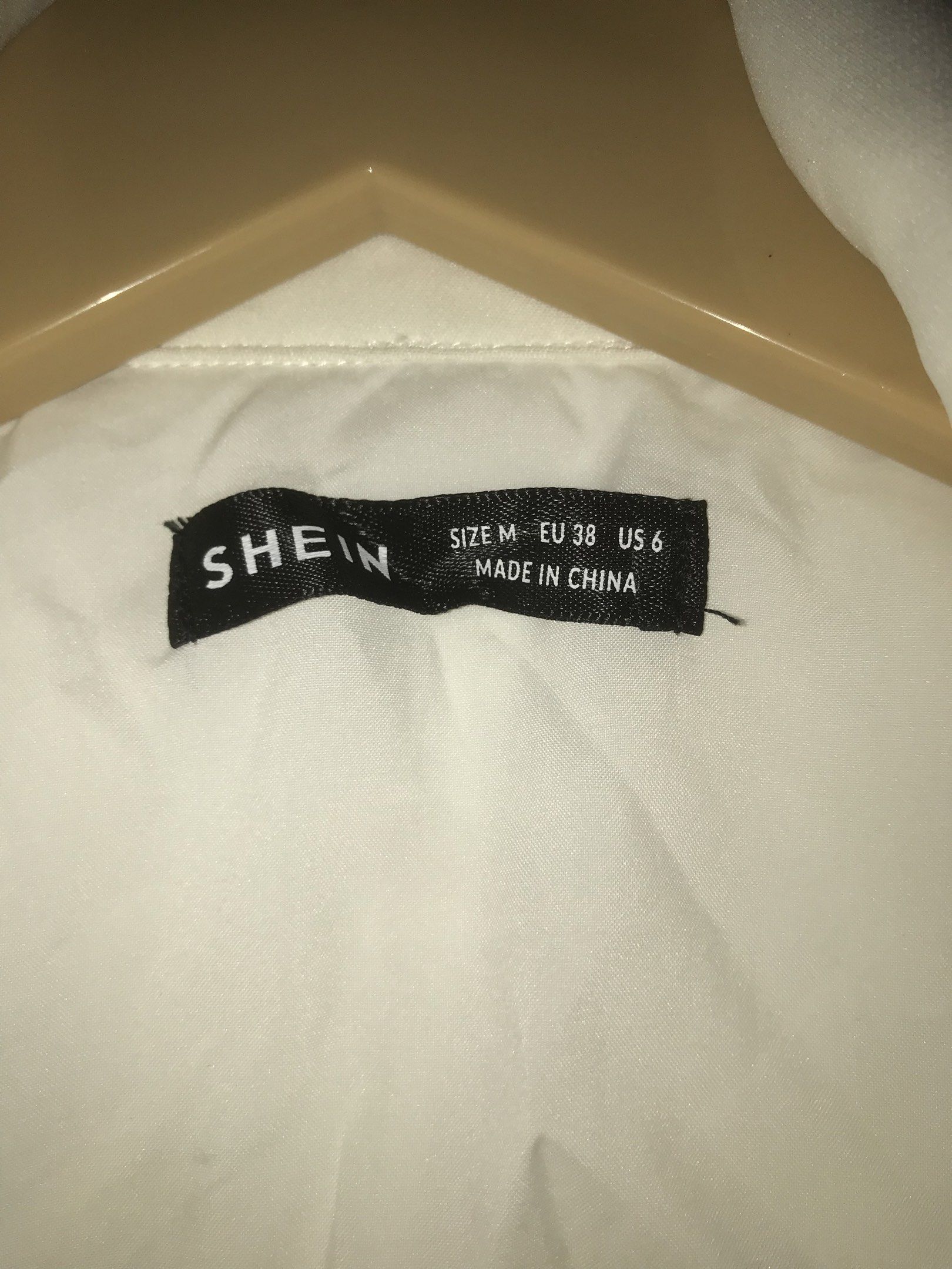 SHEIN Long White Blazer - (Category: Coats, Jackets and Outerwear) located in Makati City. Submitted by closet.declutterph (Listing ID 1417783035, Image 2). Description: - SHEIN white blazer - Size M - Single-button closure - Two front pockets.