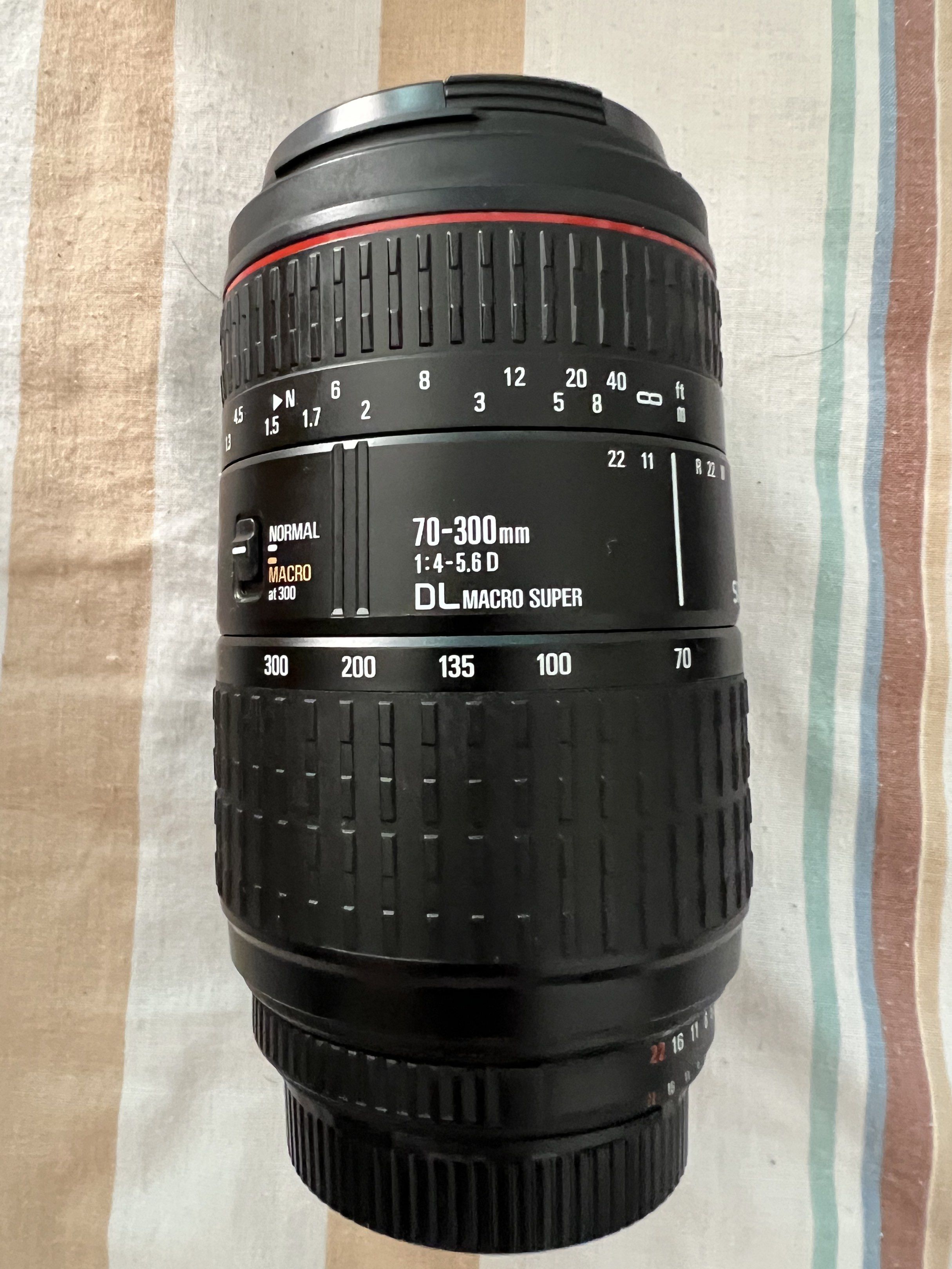 Sigma DL Macro Super AF Lens (Category: Lens & Kits) located in Las Pinas. Submitted by jerri44 (Listing ID 1417605394, Image 3). Description: Sigma Camera Macro Super DL AF Zoom Lens 70-300mm f4 -5/6 Made in Japan With box and manual.