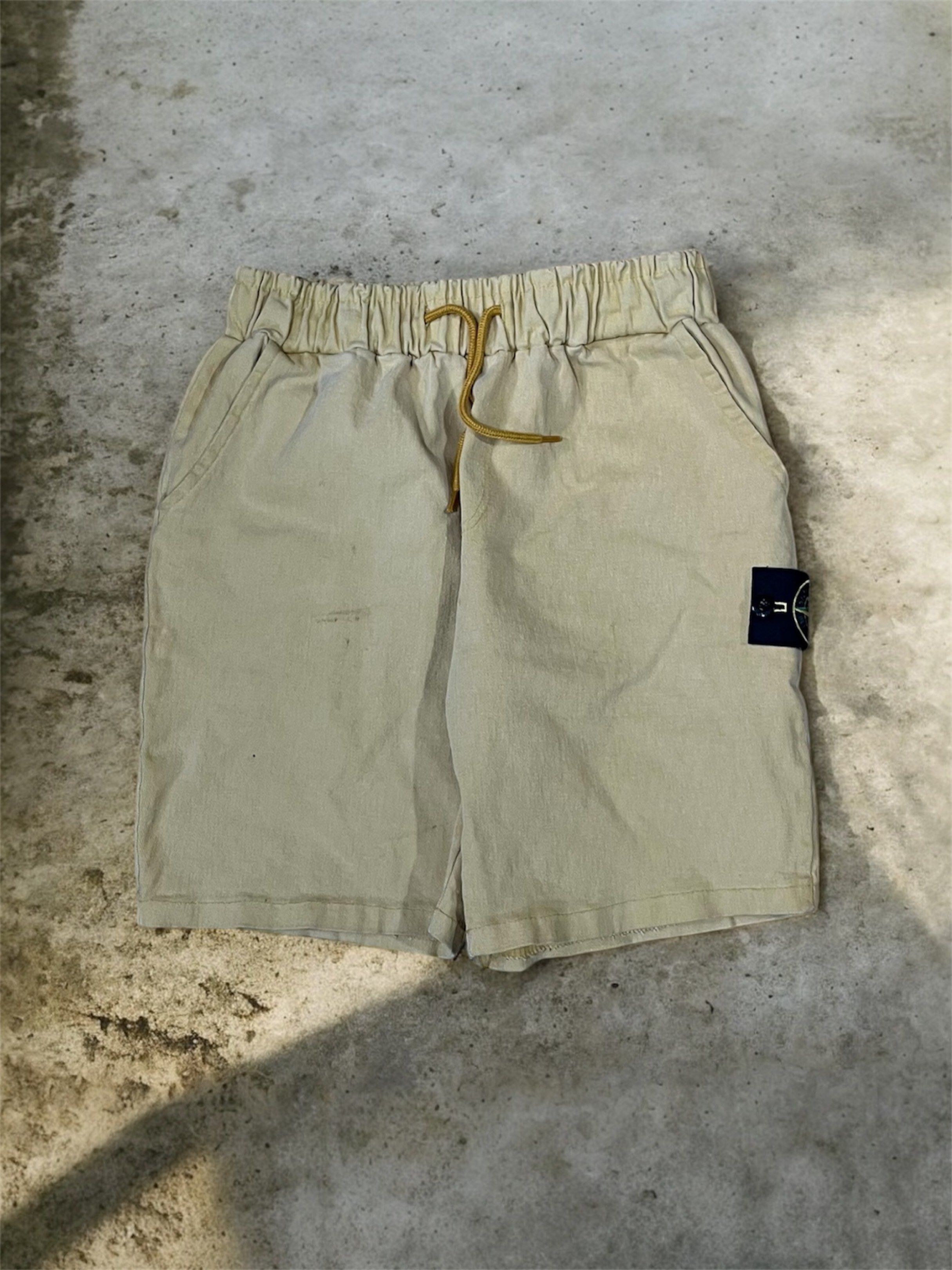 Stone Island (Category: Shorts) located in Baguio. Submitted by th.rift_shift (Listing ID 1417640571, Image 2). Description: Excellent condition No issue 24 waist 18 Length DM for more details Buyer will shoulder sf DM DM DM.