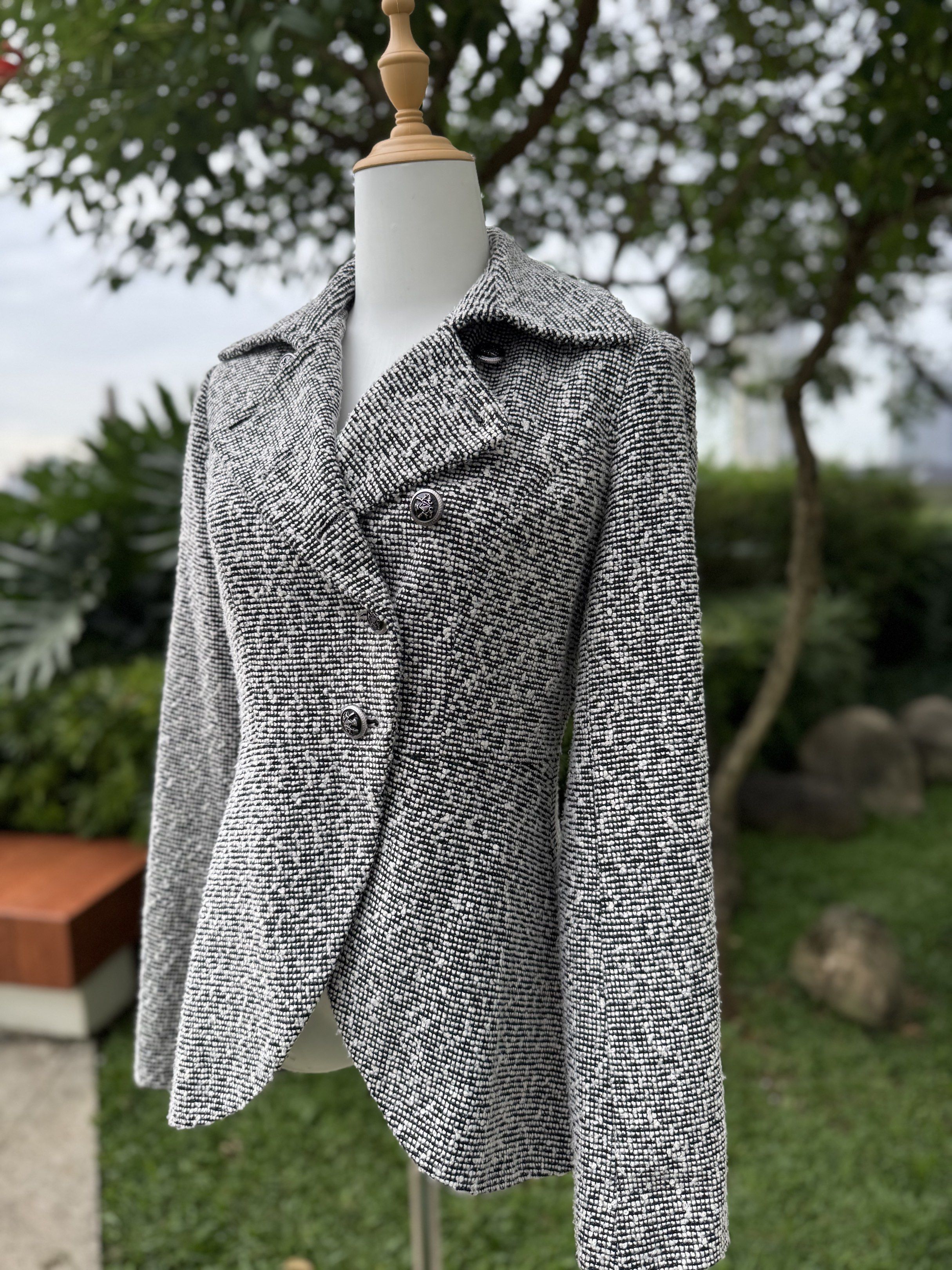 The Modern Monochrome Peplum Blazer (Category: Coats, Jackets and Outerwear) located in Makati City. Submitted by stylebliss (Listing ID 1417630523, Image 2). Description: Make a statement with this Avant-Garde Salt & Pepper Tweed Blazer. The unique asymmetric front and curved peplum hem create a stunning hourglass silhouette that transitions perfectly from “Boss Girl” office wear to high-fashion evening events. A true standout piece for those wh