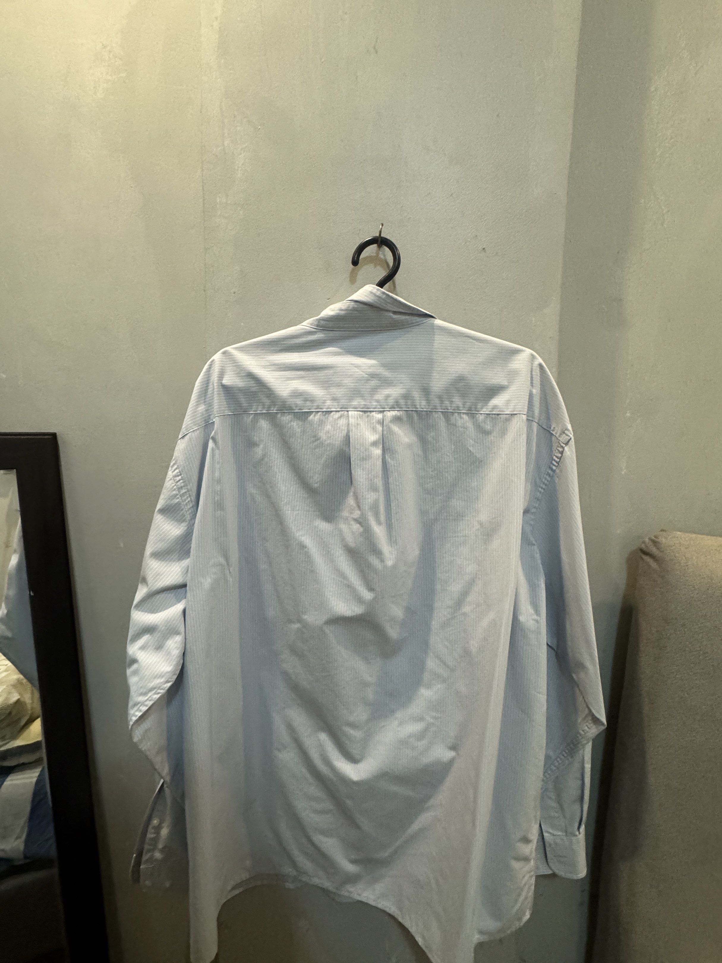Uniqlo :C Long Sleeves (Category: Tshirts & Polo Shirts ) located in Quezon City. Submitted by rhaus (Listing ID 1417765419, Image 2). Description: - Light blue striped long sleeve shirt - Button-down front - Classic collar - Relaxed fit - Back yoke and pleats for comfort - Suitable for casual and semi-formal occasions.